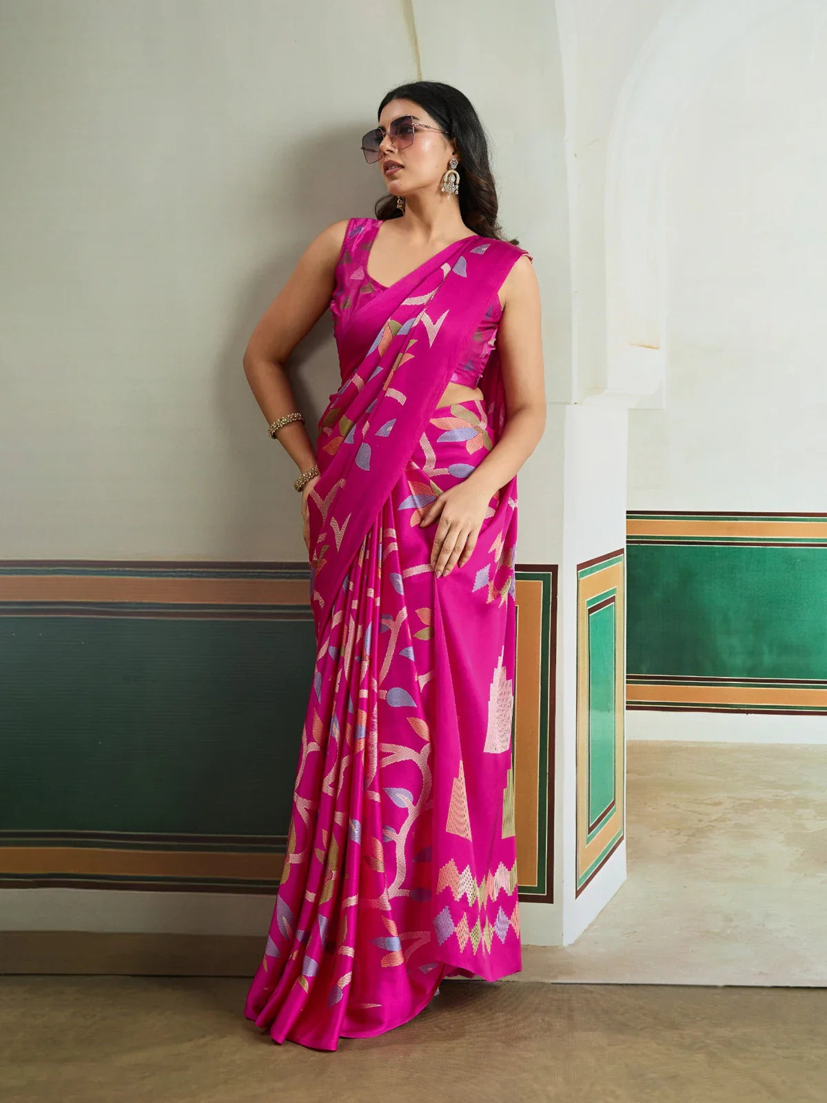 Tarani modal satin pink saree full view with multicolor floral geometric motifs and sleeveless blouse