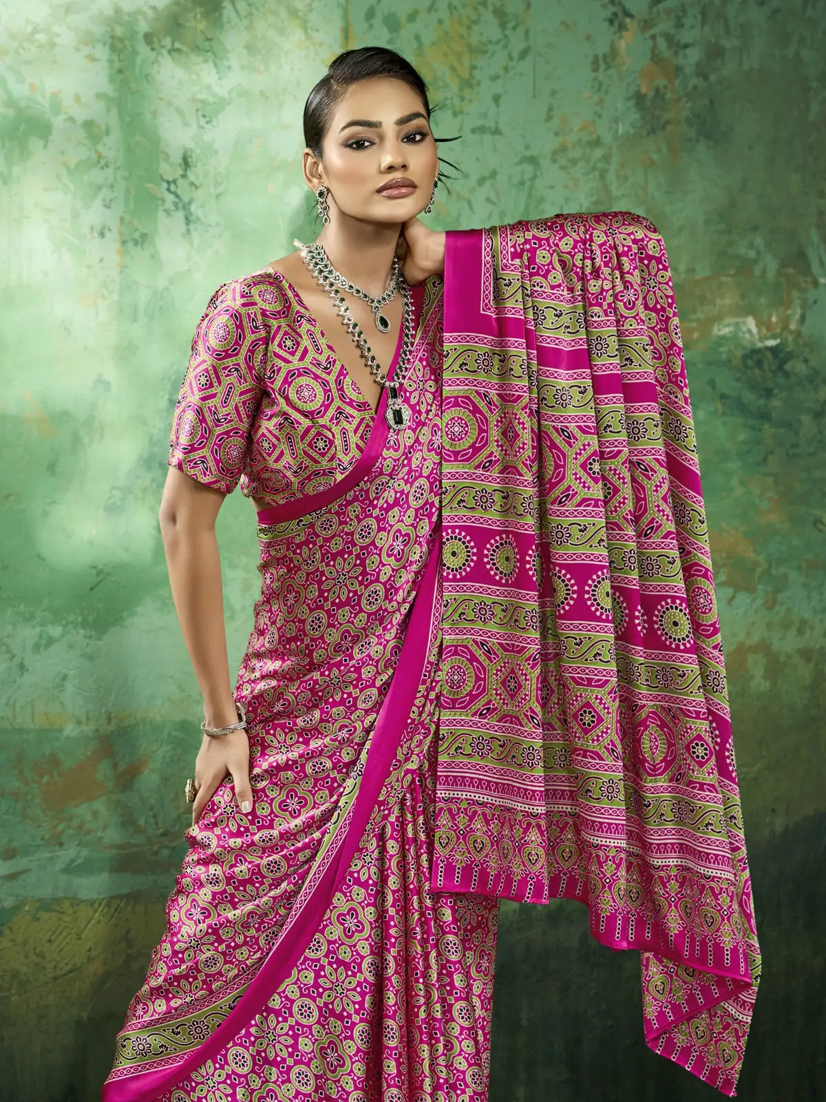 Tarani pink Ajrakh print saree pallu view showcasing detailed border and traditional print design