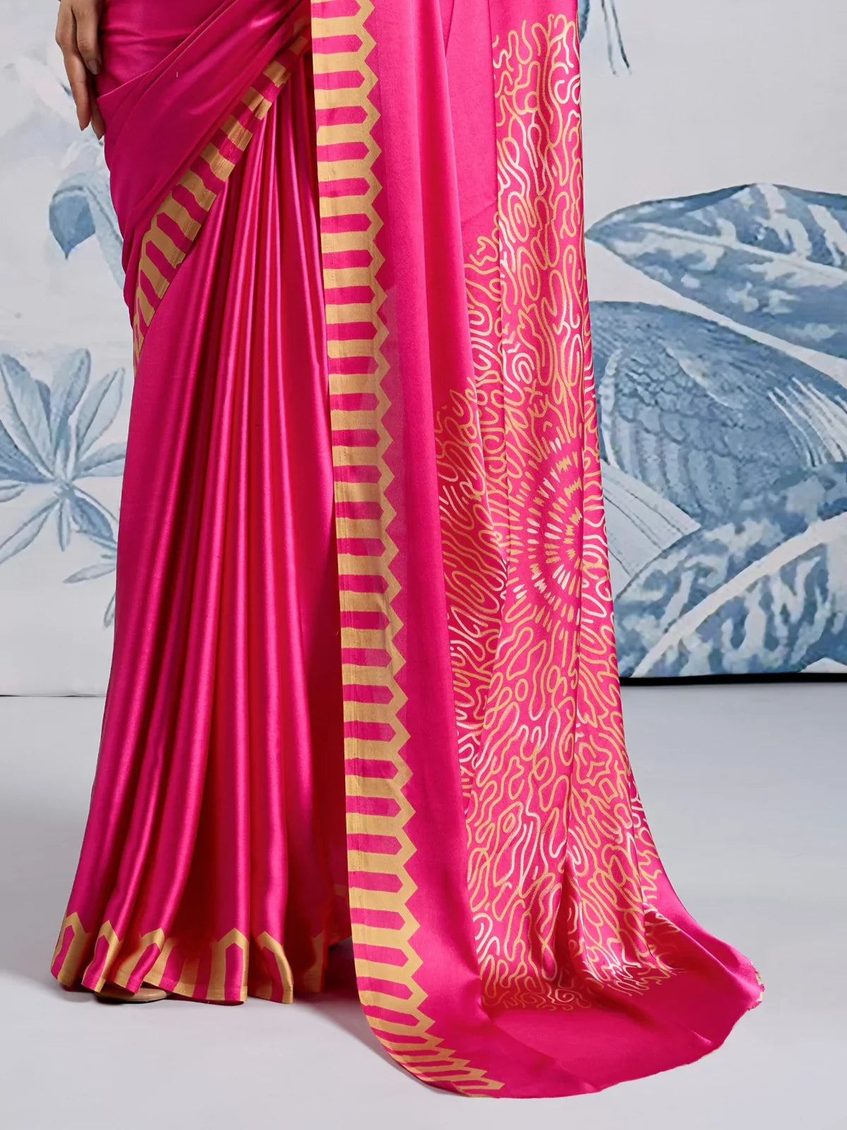 Tarani modal satin pink saree pallu view with designer blouse and golden Ajrakh print