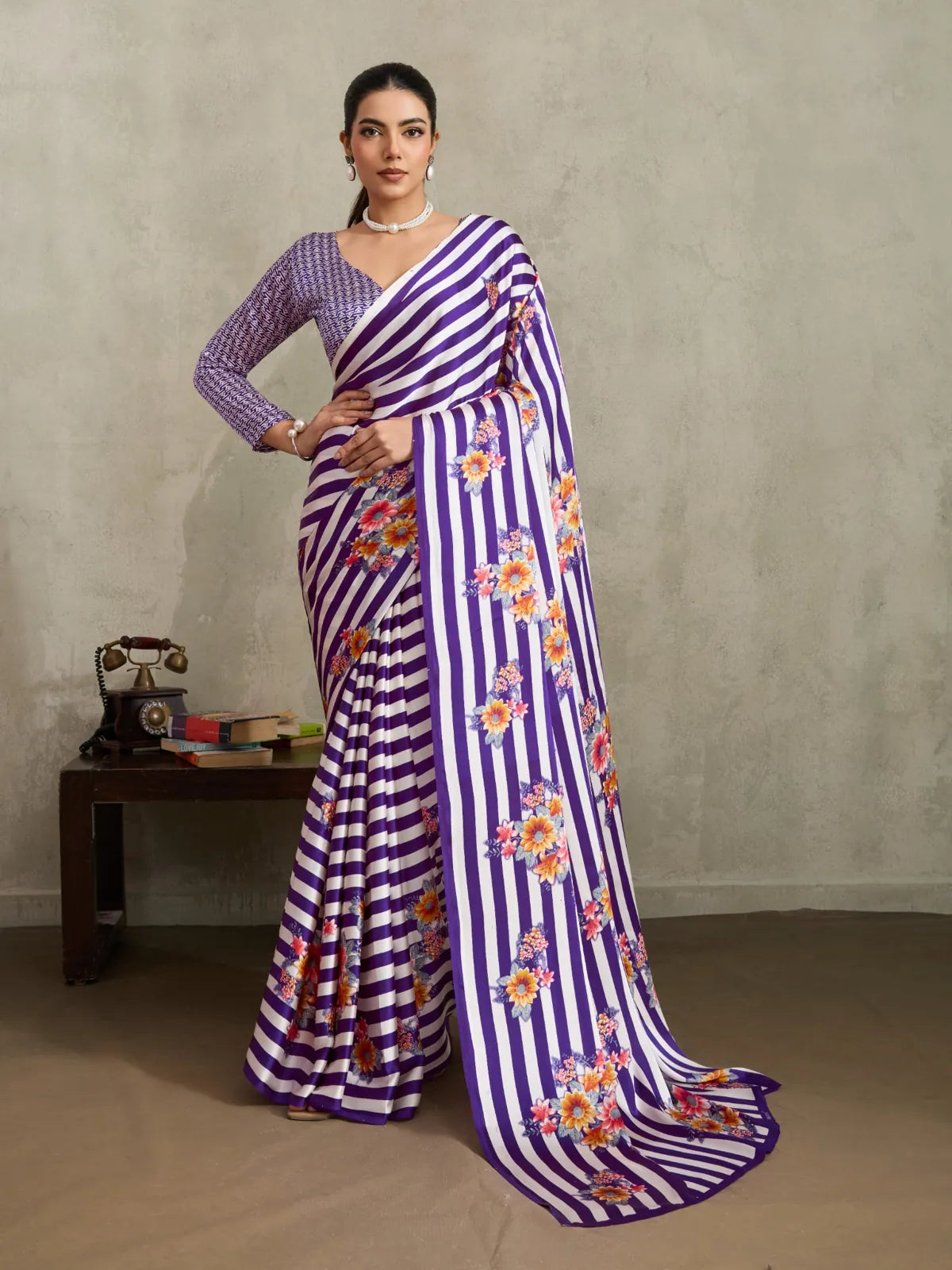 Tarani modal satin purple saree with floral stripes in full view worn by model for casual occasions