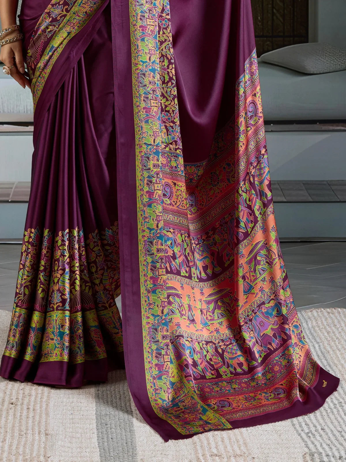 Tarani detailed pallu view showcasing multicolor ajrakh motifs on modal satin saree