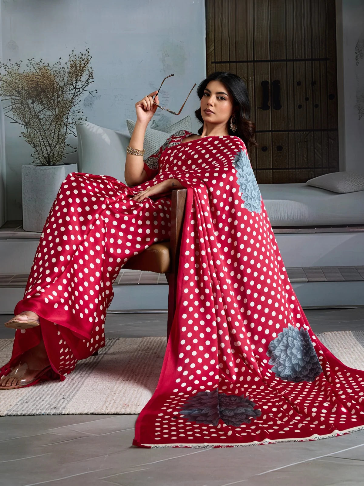 Tarani red modal satin Ajrakh print saree stylish side pose with floral pallu