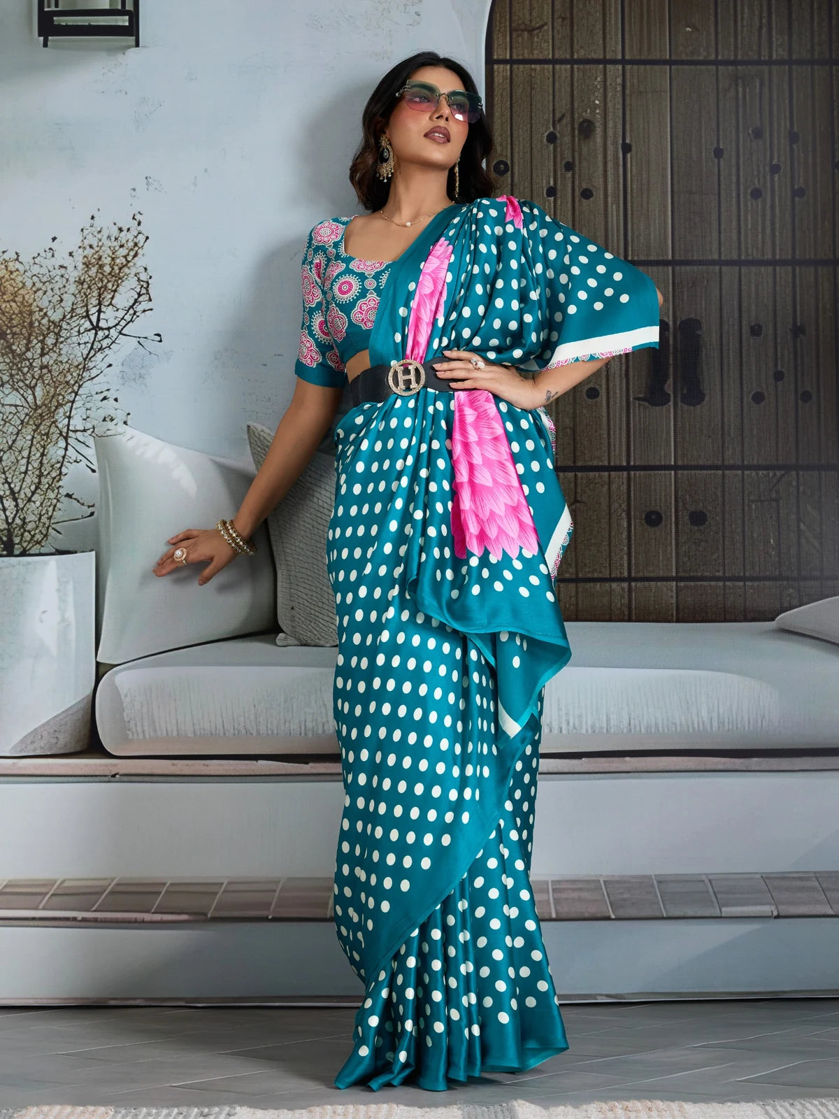 Tarani teal polka dot Ajrakh print saree with floral pallu front pose