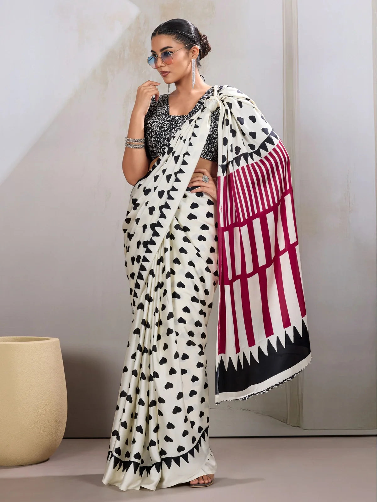 Tarani white modal satin saree with black heart print and wine striped pallu front view