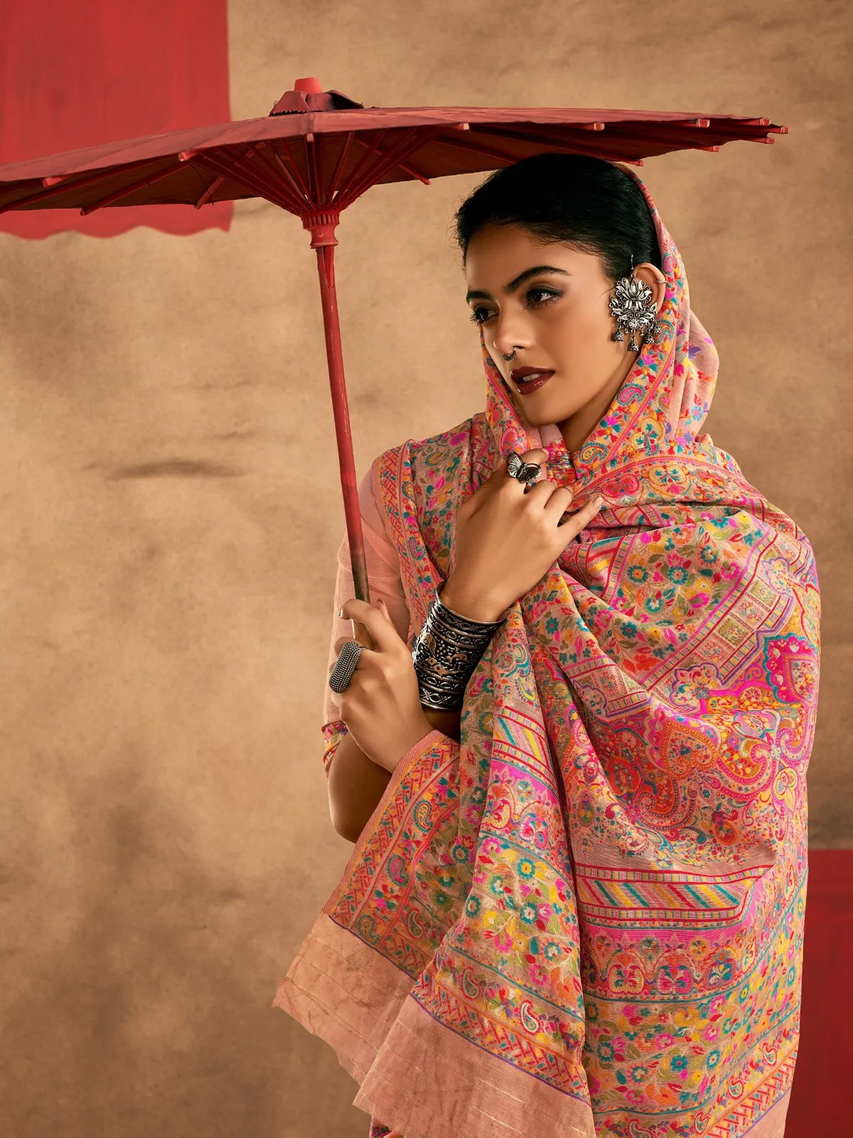 Tarani elegant peach saree with pashmina-style weave and detailed pallu close-up view