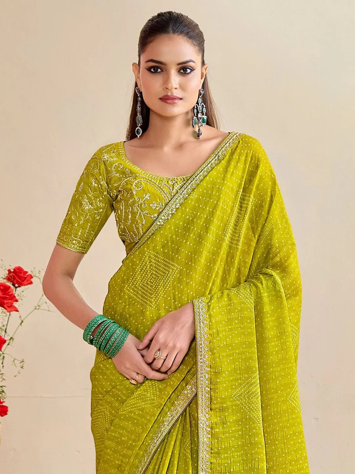 Tarani upper body view of green moss chiffon silk saree with embroidered blouse