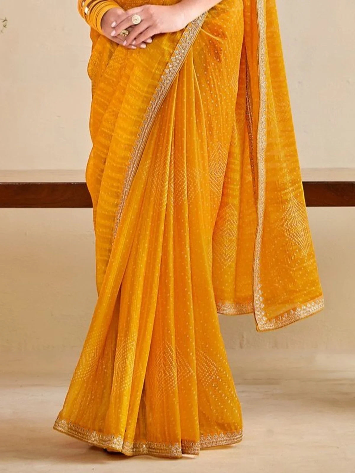 Tarani yellow moss chiffon silk saree pallu and border detailing closeup