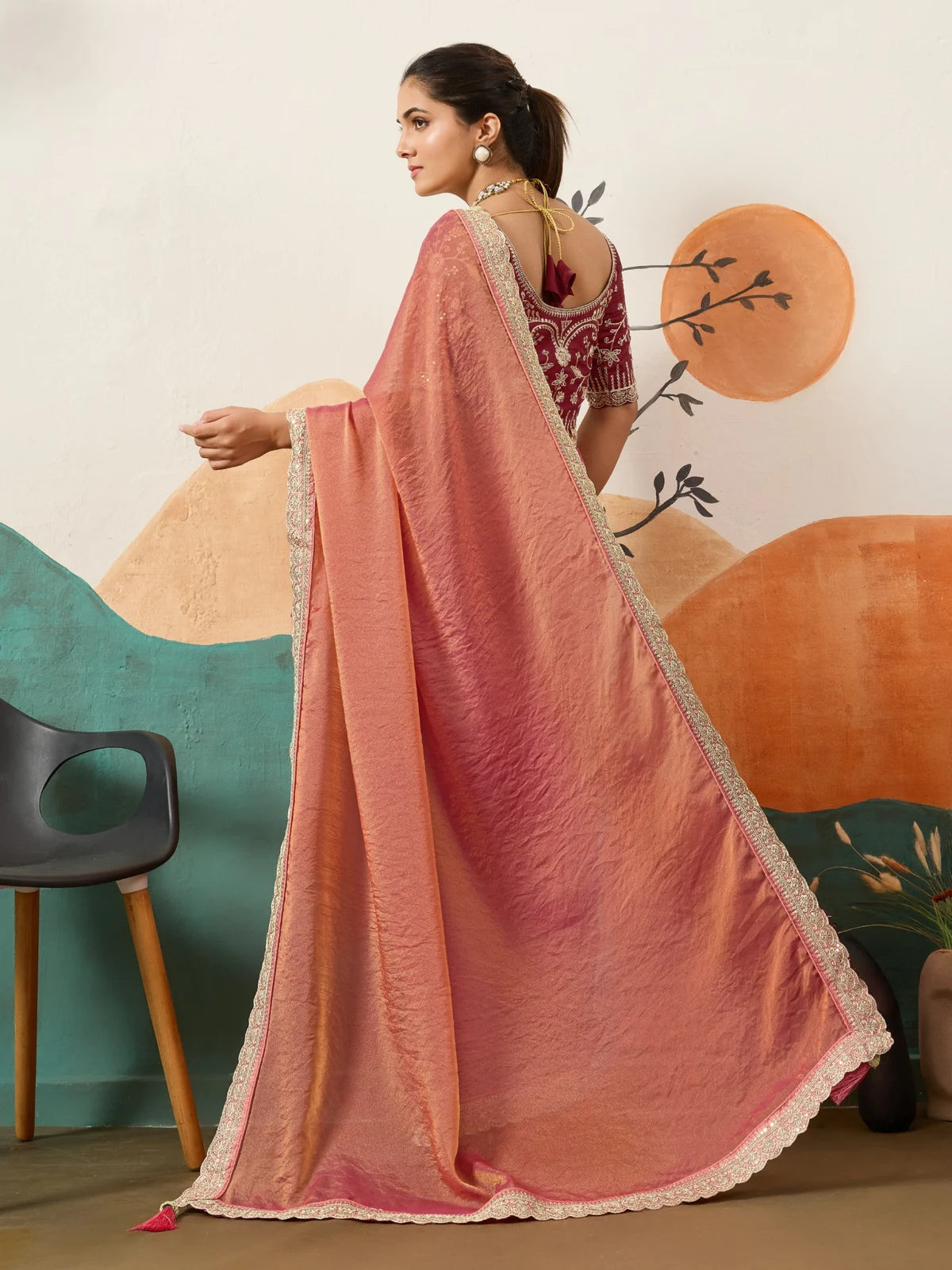 Tarani pink party wear saree back view with detailed border and blouse design