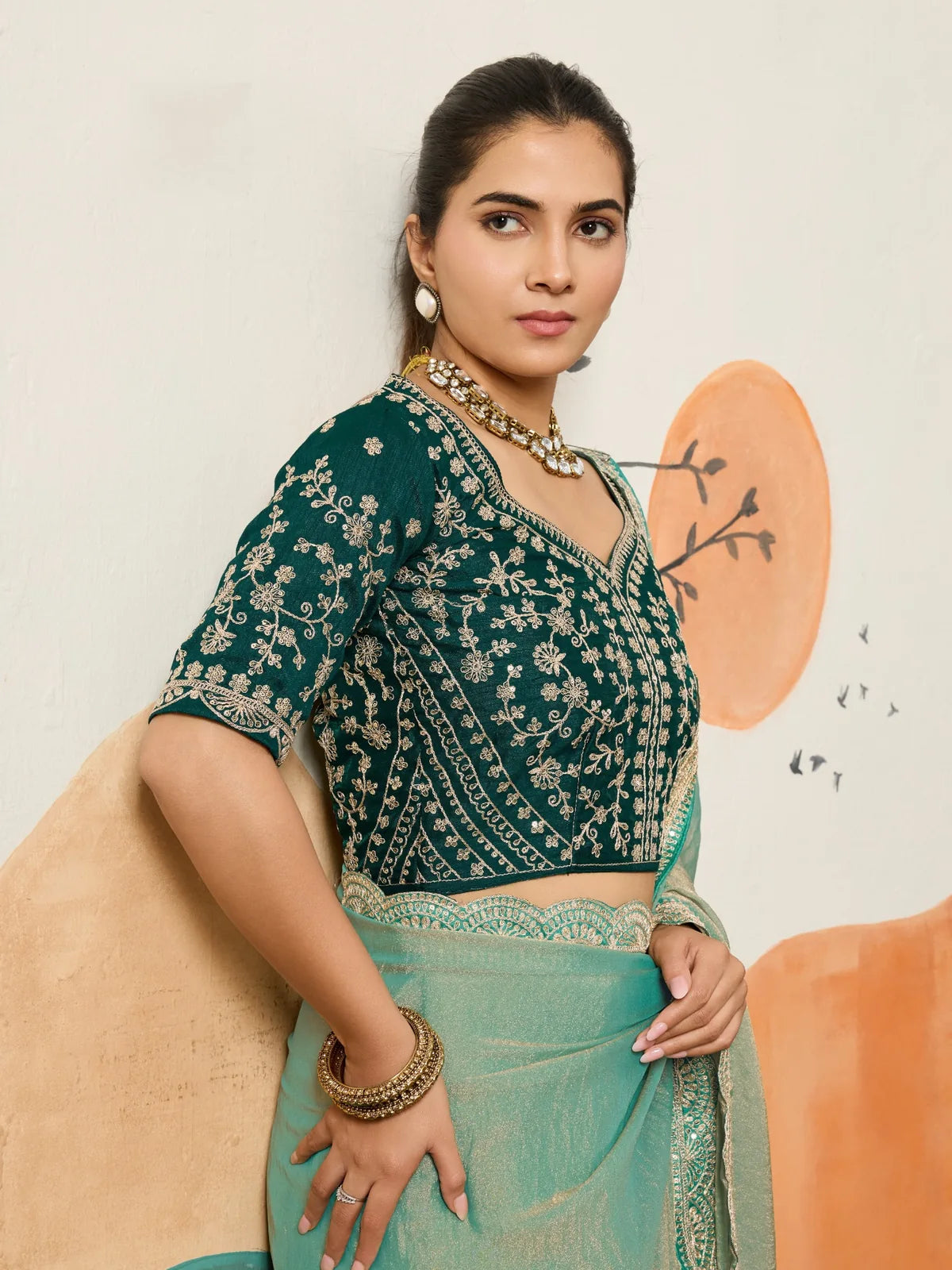 Tarani sea green party wear saree with detailed embroidered blouse upper body portrait