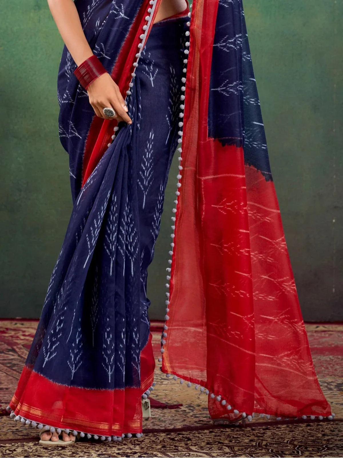 Tarani navy blue mul mul cotton saree pallu view highlighting elegant border