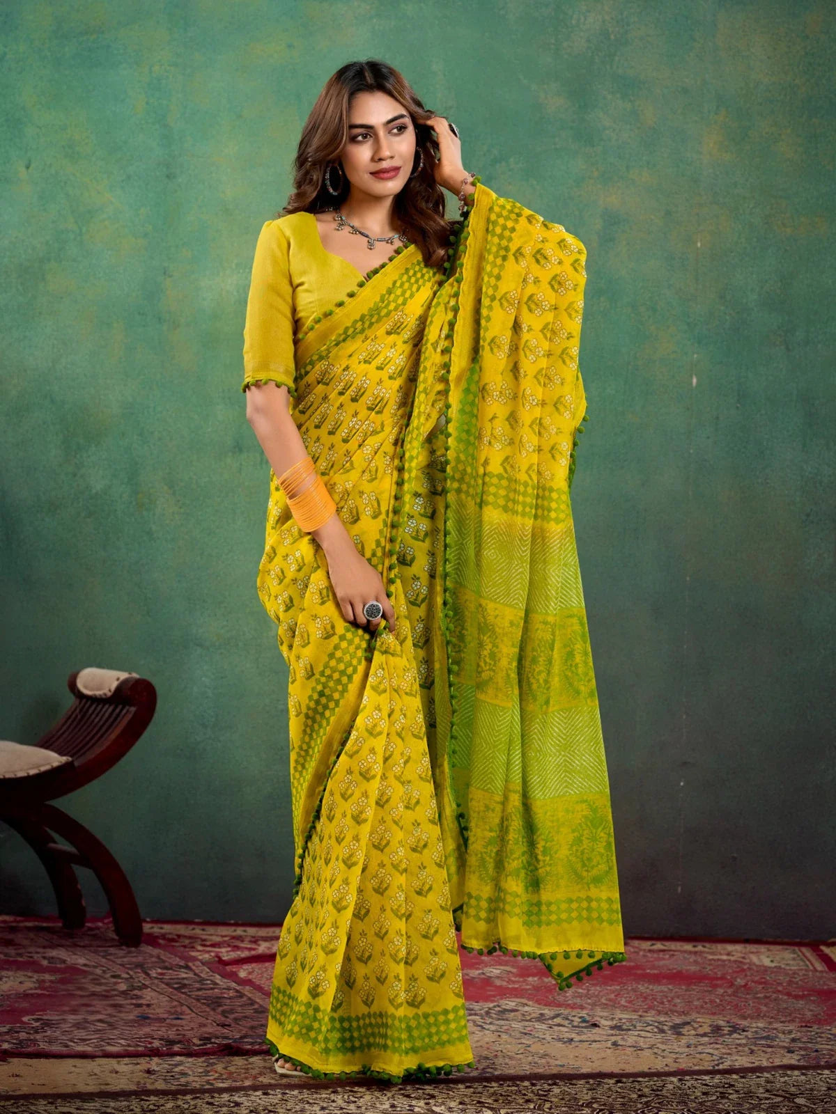 Tarani yellow mul mul cotton saree full view with festive floral design and blouse piece