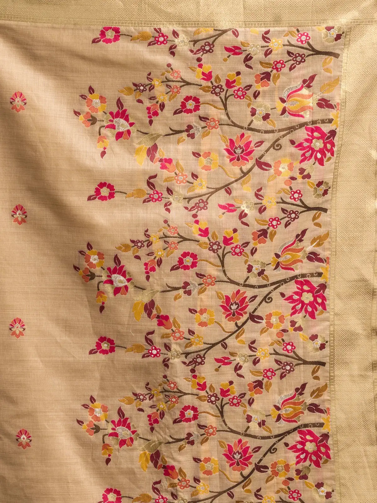 Tarani close pallu view of beige Munga Cotton Mina Work saree with floral woven detailing