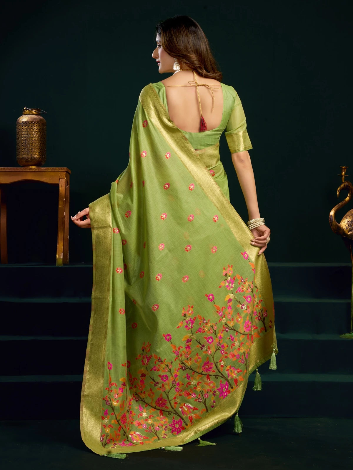 Tarani green Munga Cotton Mina Work saree back view showcasing blouse style and pallu drape