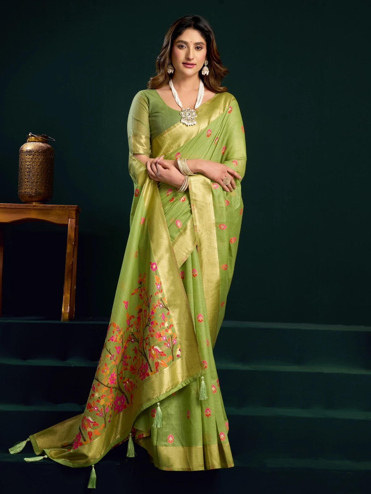 Tarani green Munga Cotton Mina Work saree front view with floral woven pallu and zari border