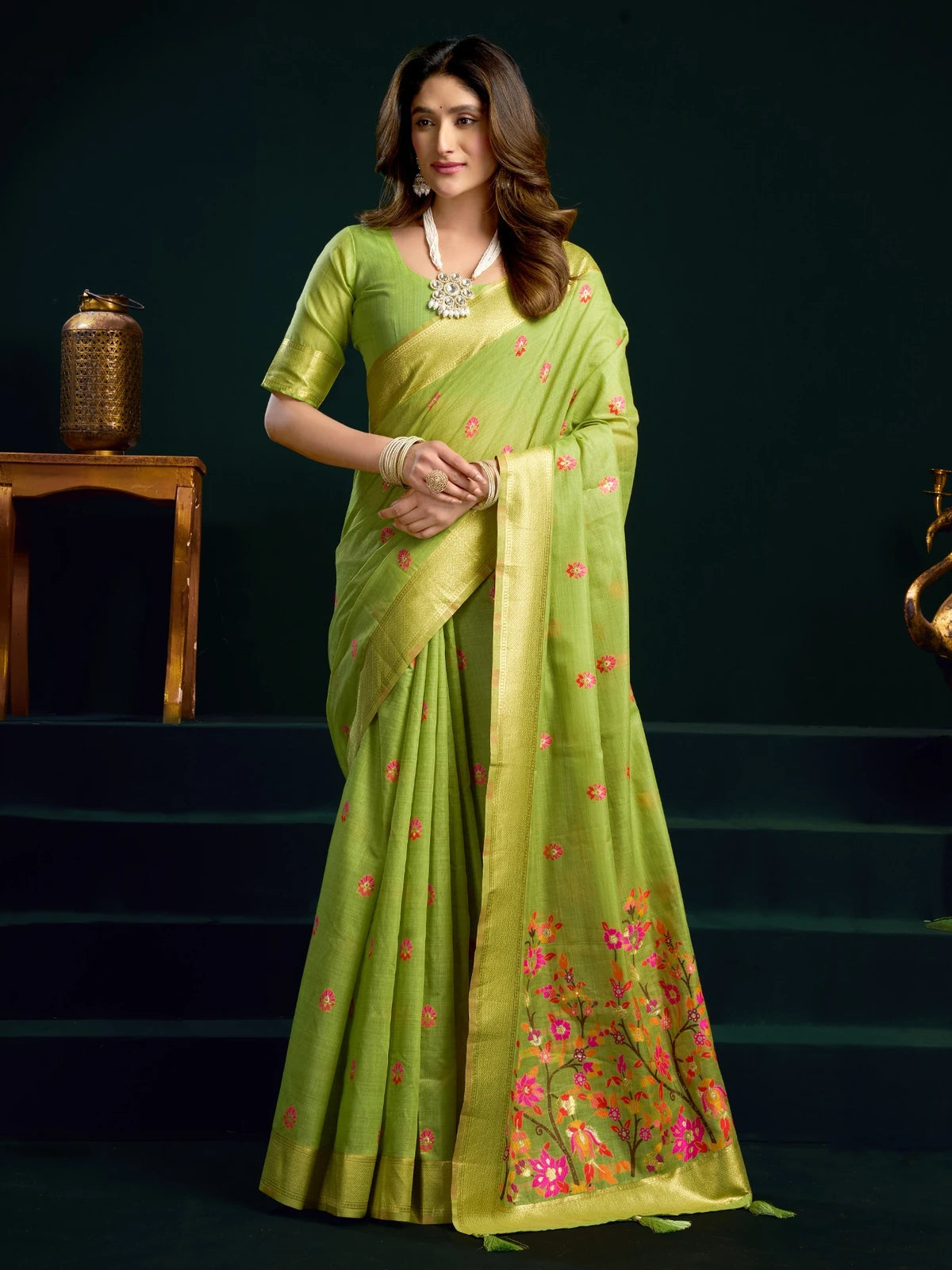 Tarani green Munga Cotton Mina Work saree full view with zari border and floral pallu for festive occasions