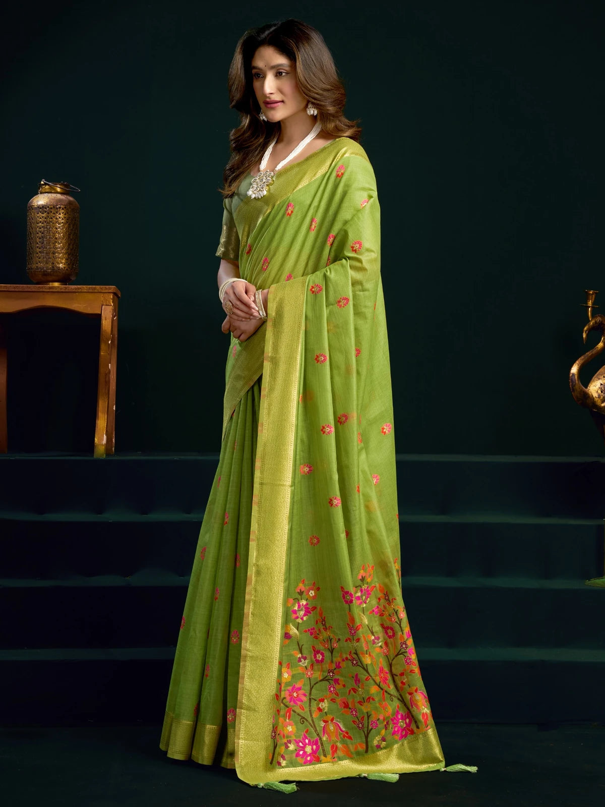 Tarani green Munga Cotton Mina Work saree side view with elegant zari border and floral motifs