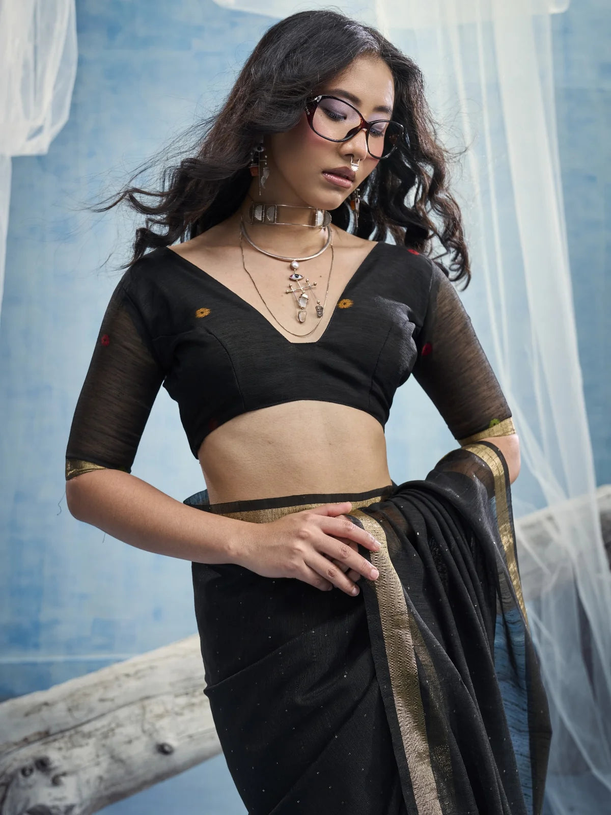 Tarani Samira black Munga Silk saree upper body view showing handloom blouse and elegant border