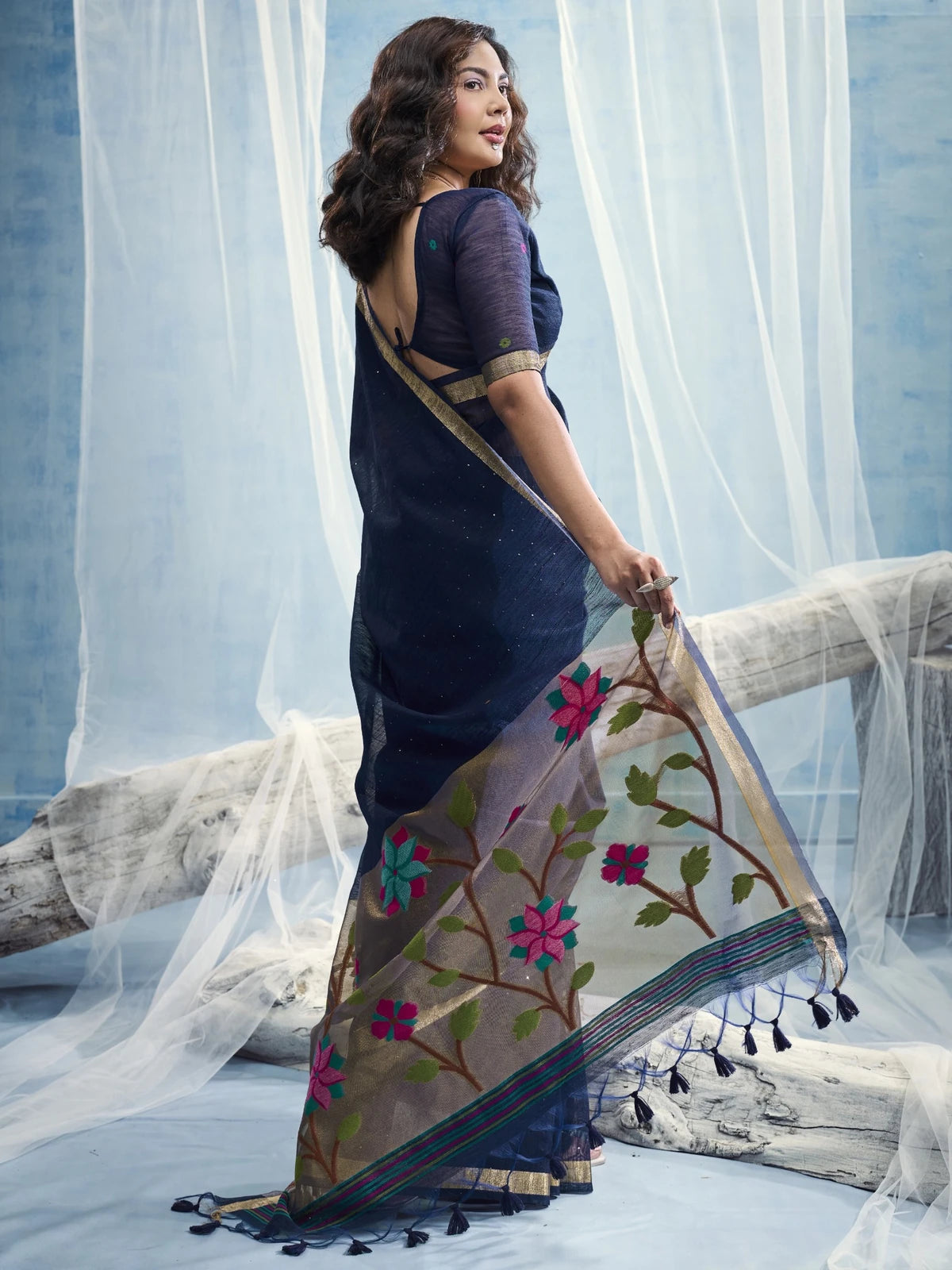 Tarani Aryavi navy blue back view saree with floral tissue pallu and handloom blouse