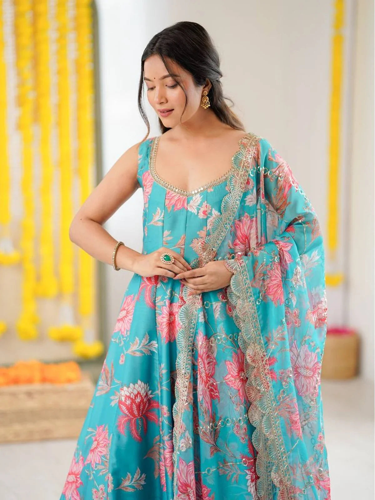 Tarani turquoise muslin Anarkali dress upper body view with lace detailing