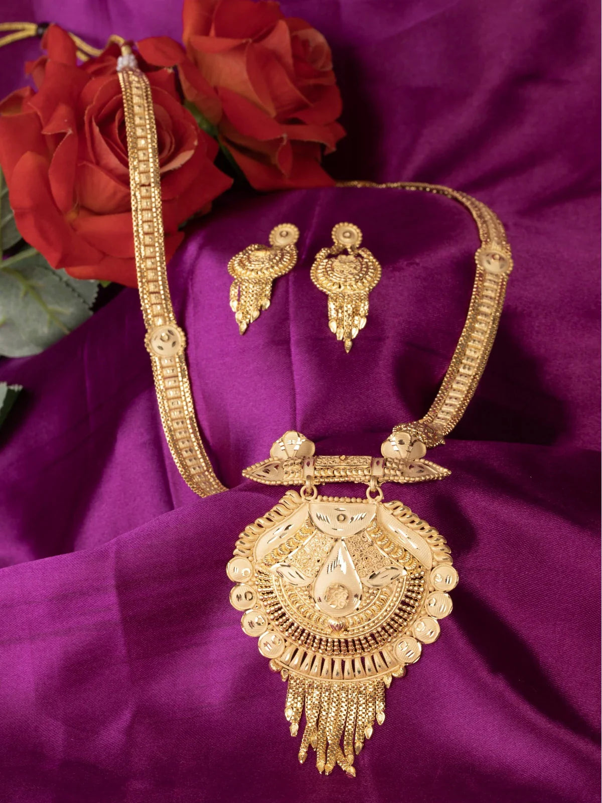 Tarani gold plated necklace set with intricate antique design and earrings for festive wear