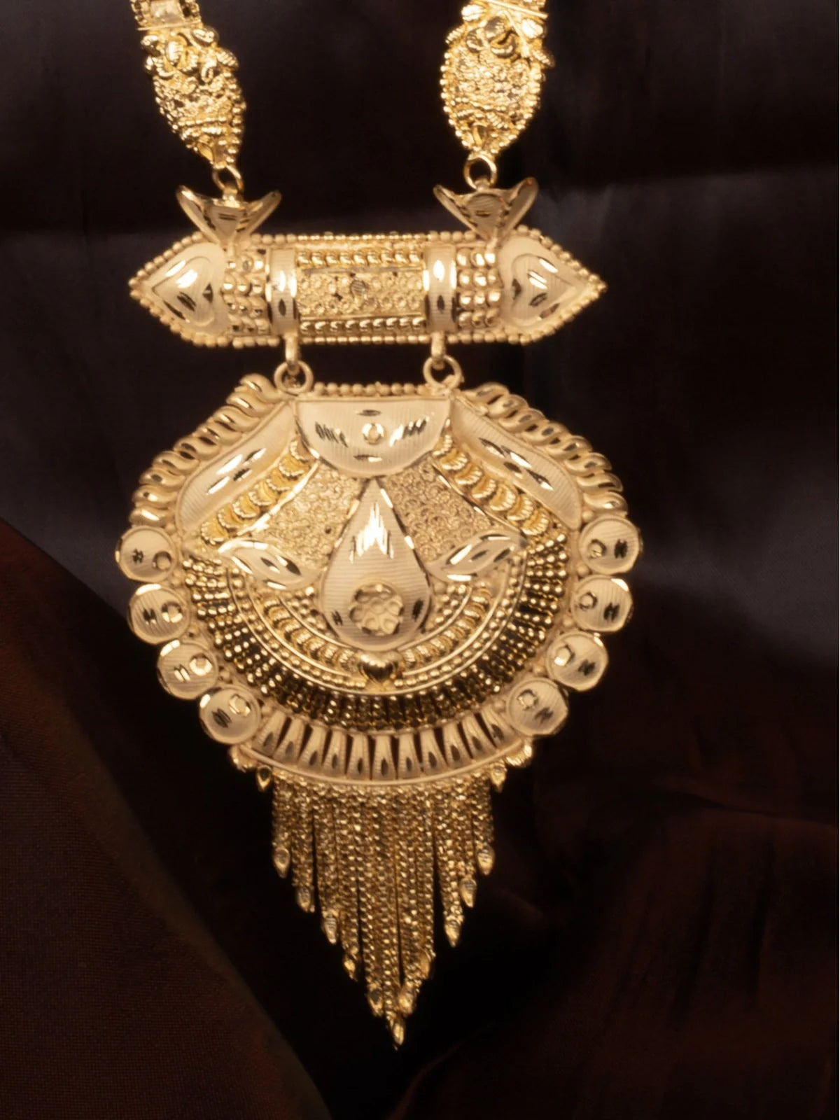 Tarani gold plated necklace set closeup view for festive and wedding wear