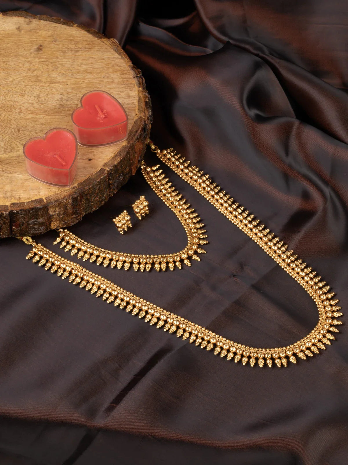 Tarani gold plated necklace set with beaded design for festive and wedding wear