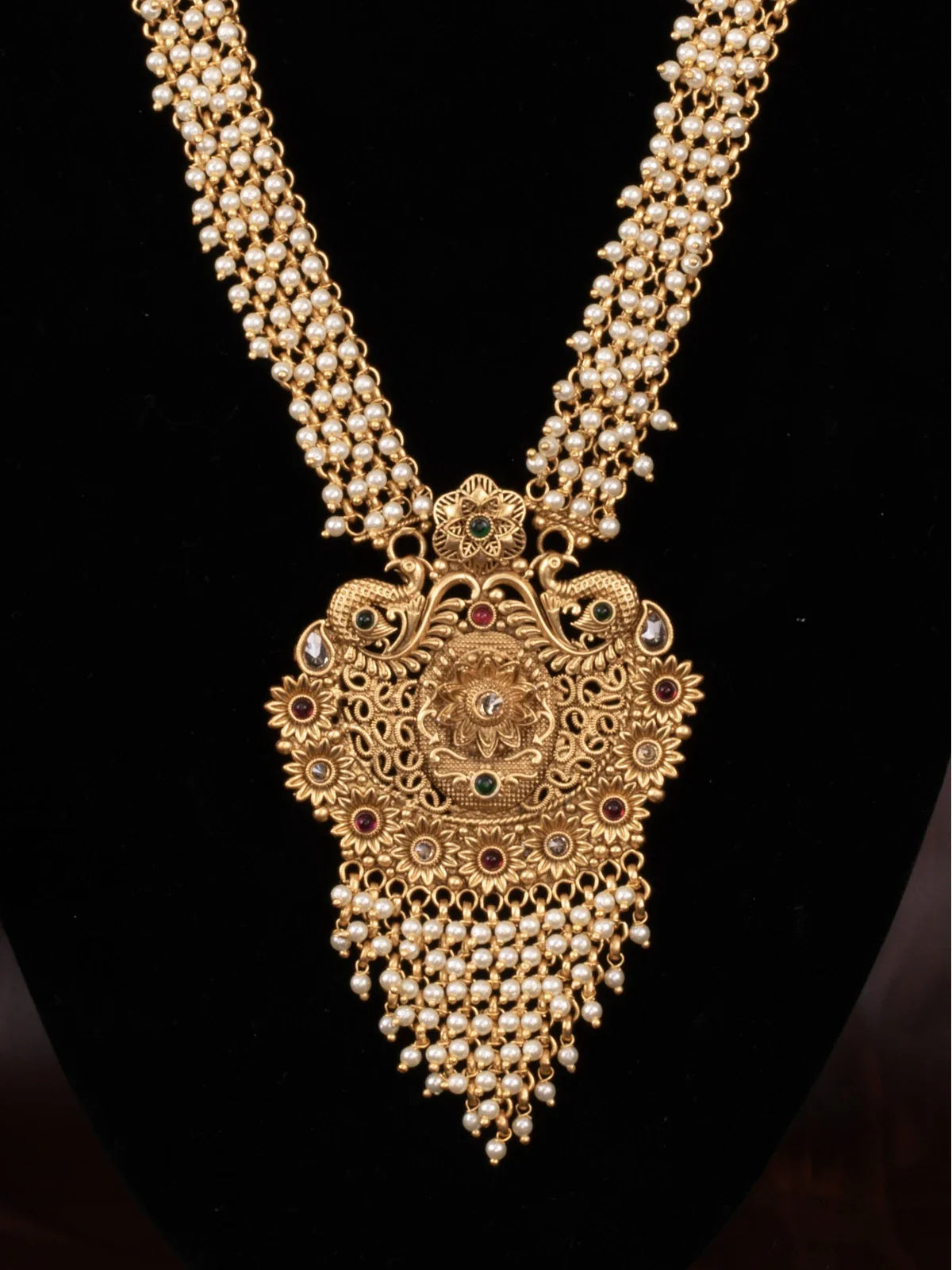 Tarani closeup view of gold plated pearl bridal necklace pendant design