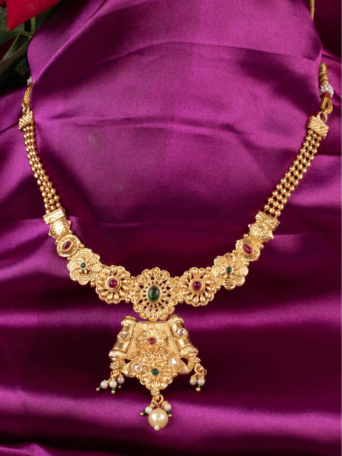 Tarani gold plated necklace with antique stone studded design for festive wear