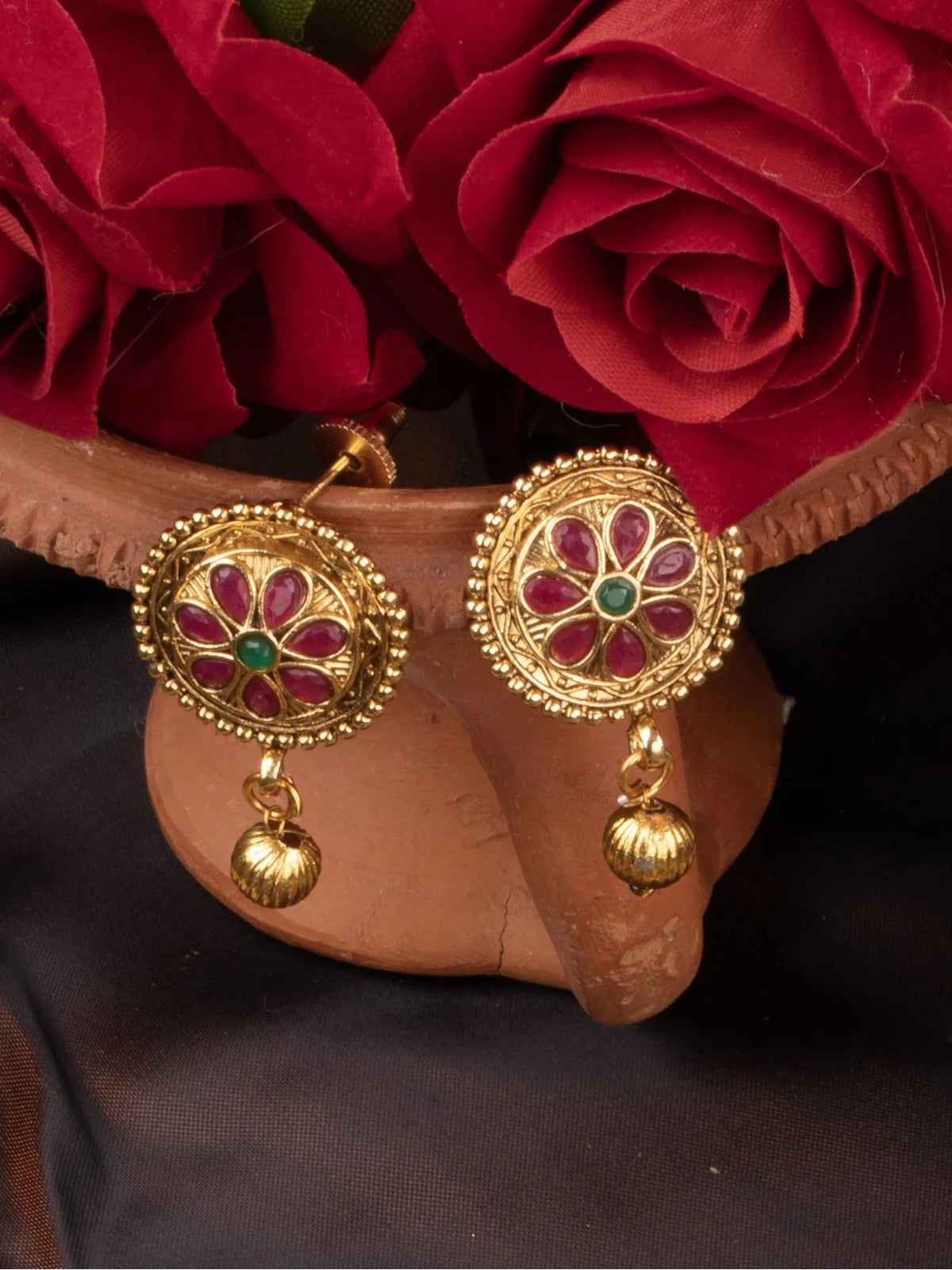 Tarani earrings view of gold plated necklace set with floral stone design for traditional look
