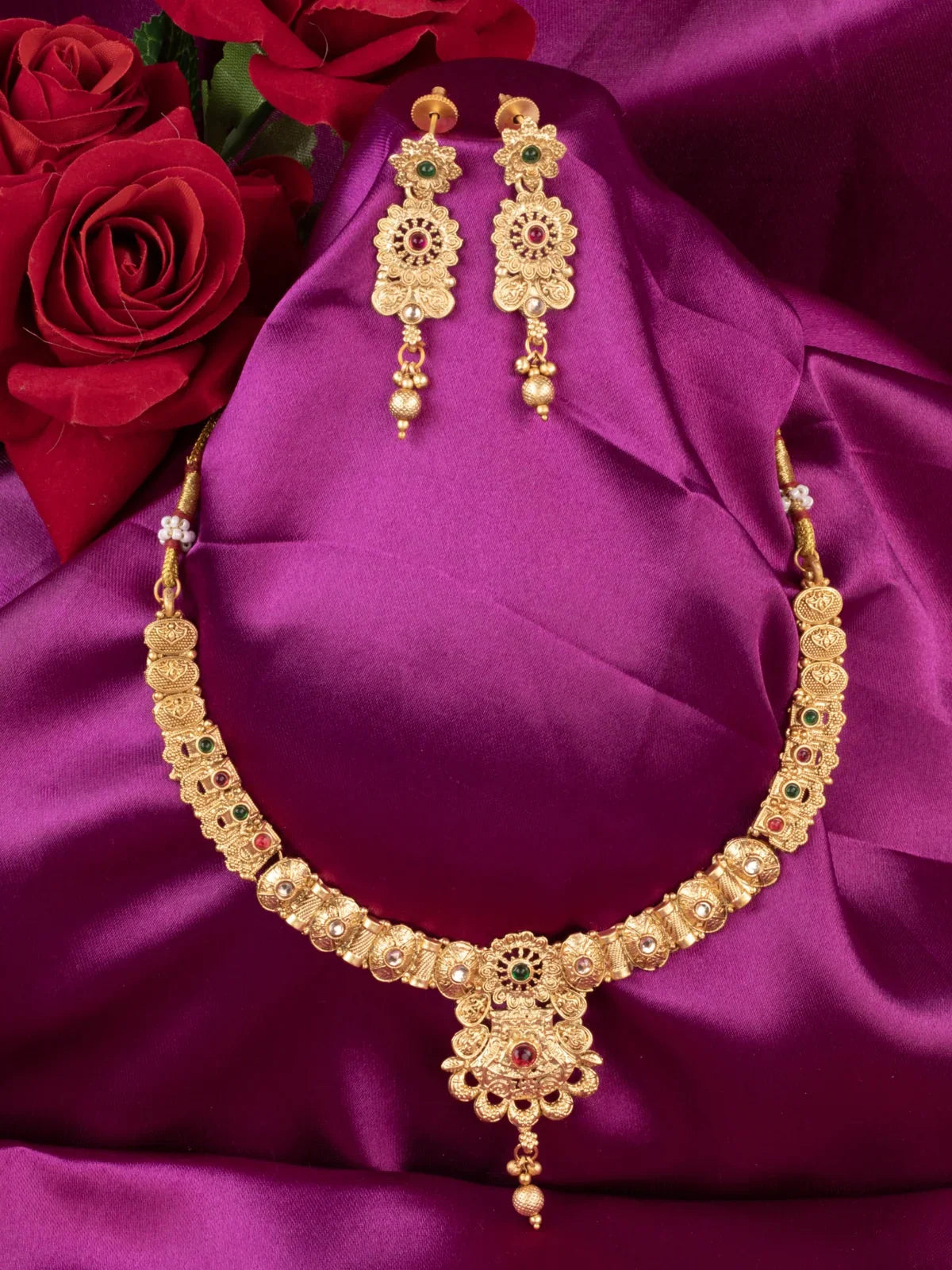 Tarani gold plated necklace set with antique multicolor stone work and matching earrings for weddings