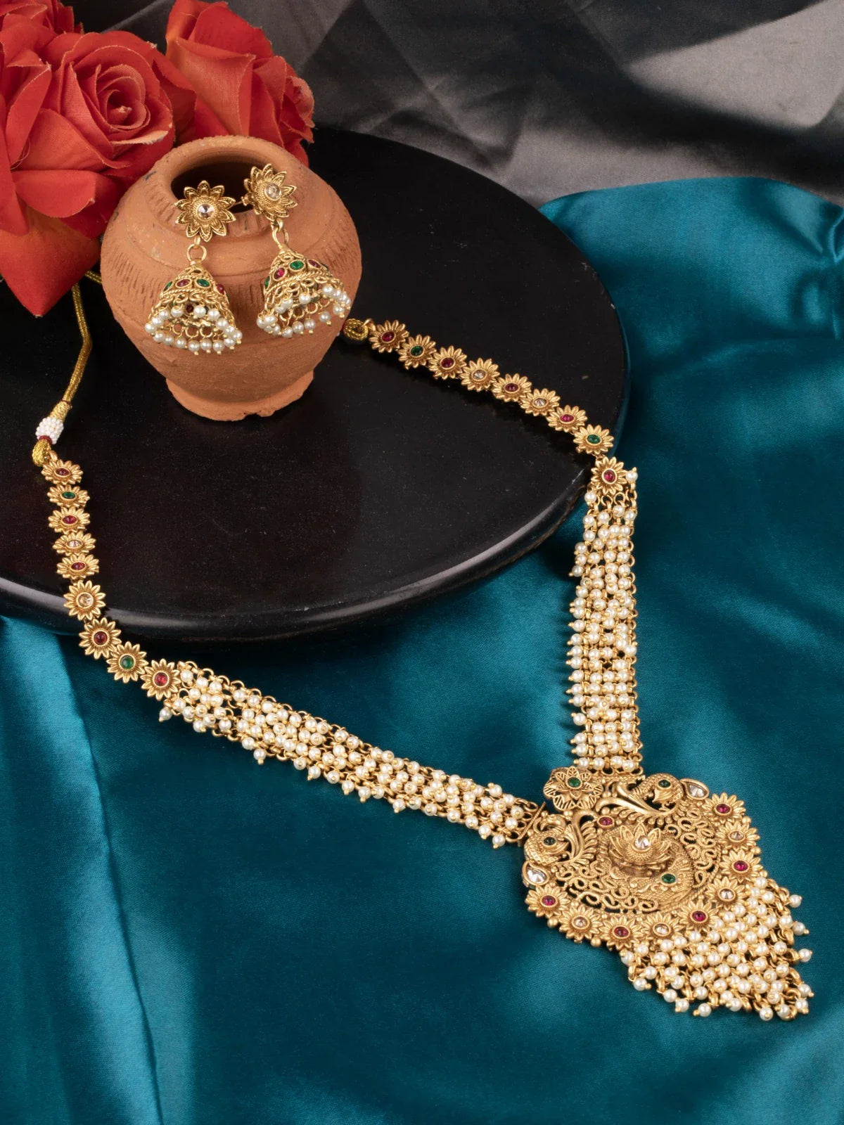 Tarani gold plated necklace set with antique pearl detailing for weddings