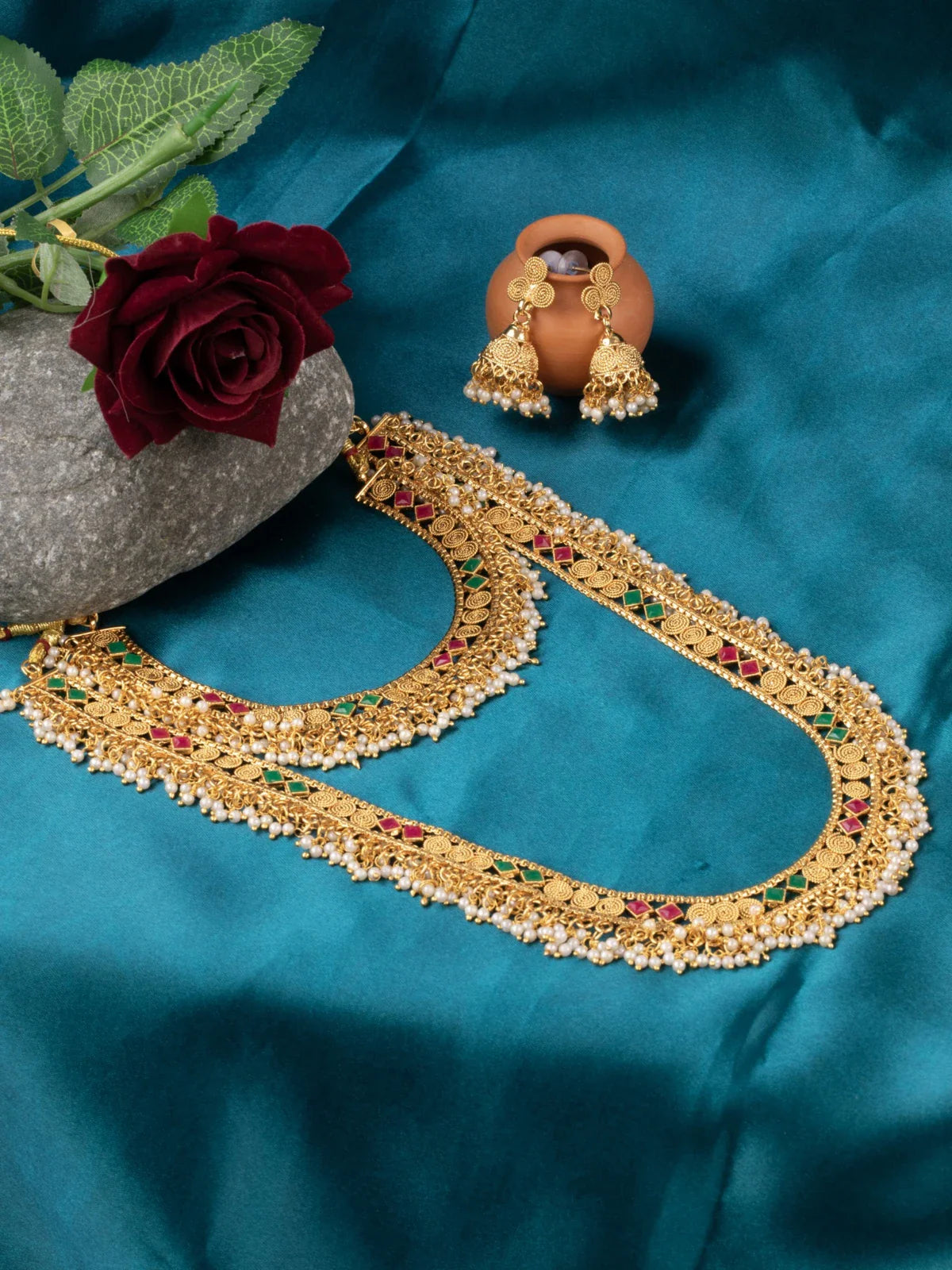 Tarani designer gold plated necklace set with pearl beads and earrings for weddings