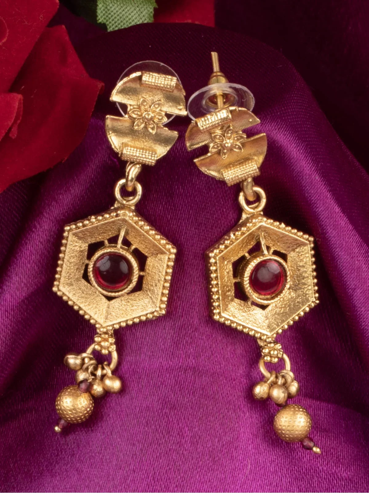 Tarani earrings from necklace set with gold plating and red stone design for festive wear