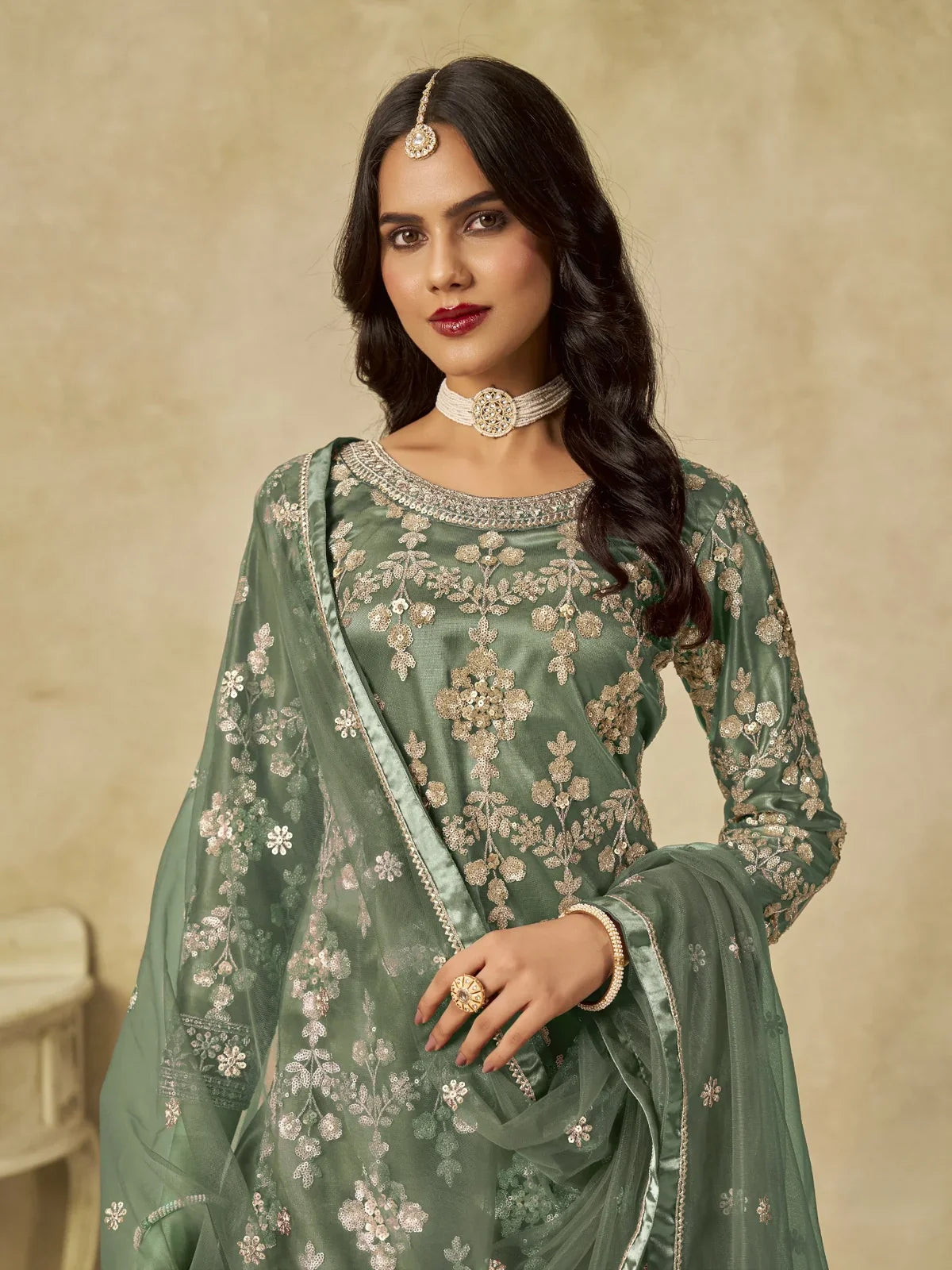Tarani green net upper body view with embroidery and zari work details
