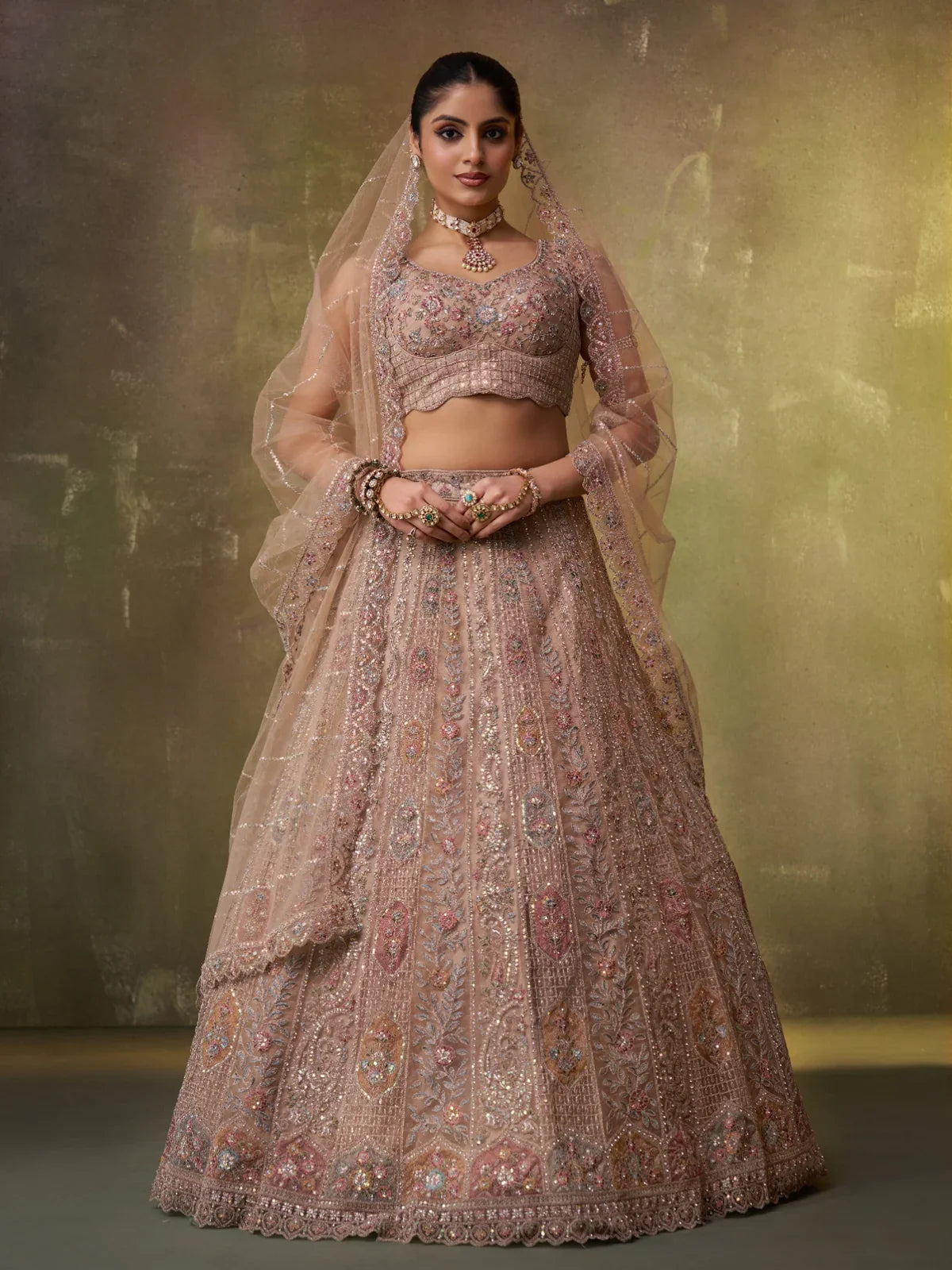 Tarani beige net lehenga full view with sequins and thread embroidery for weddings