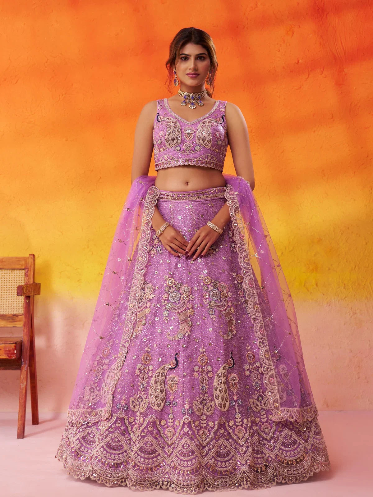 Tarani lavender net lehenga with peacock embroidery, sequins, and stonework for festive occasions