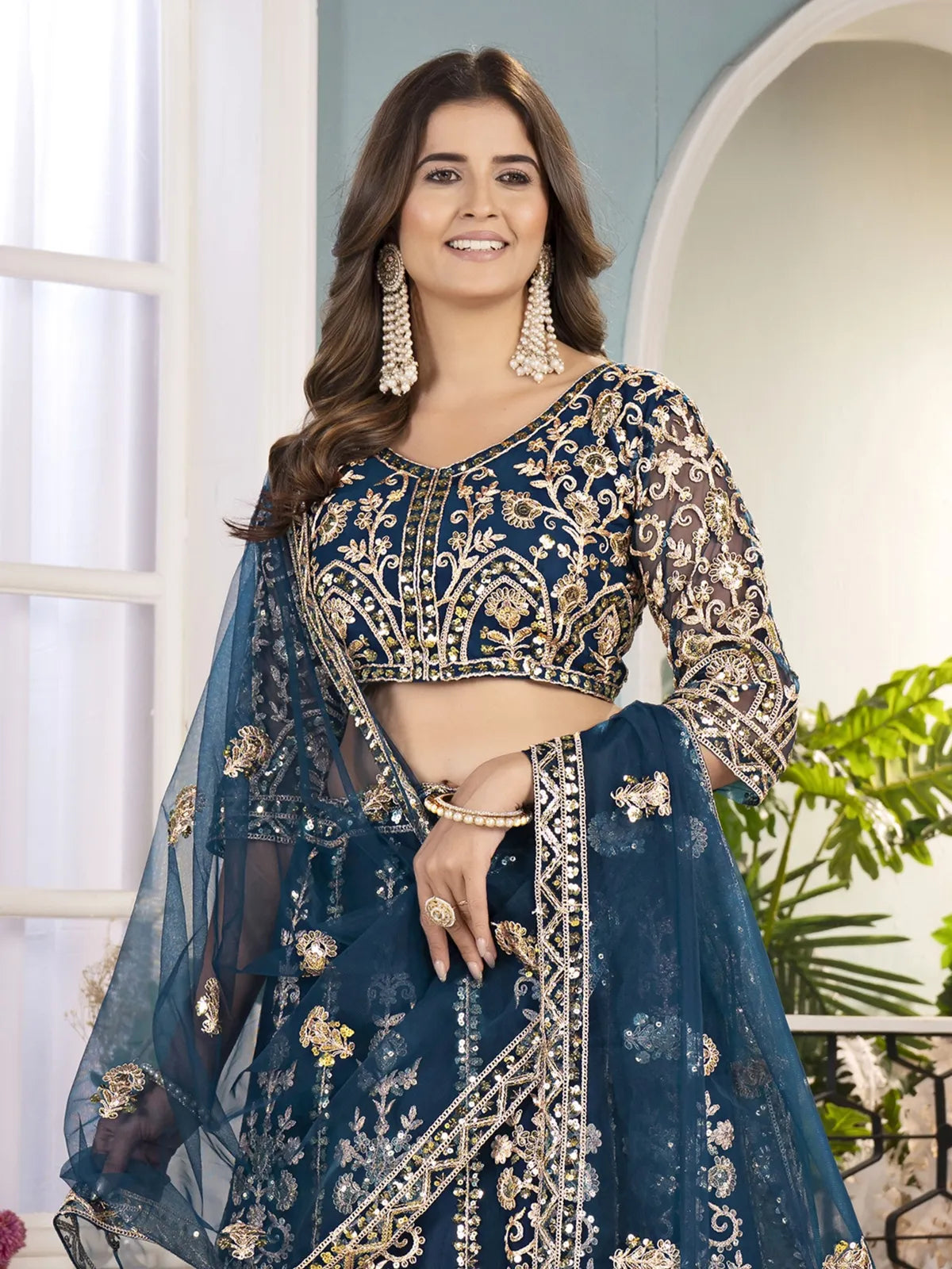 Tarani navy blue net lehenga close upper body view with embroidery blouse