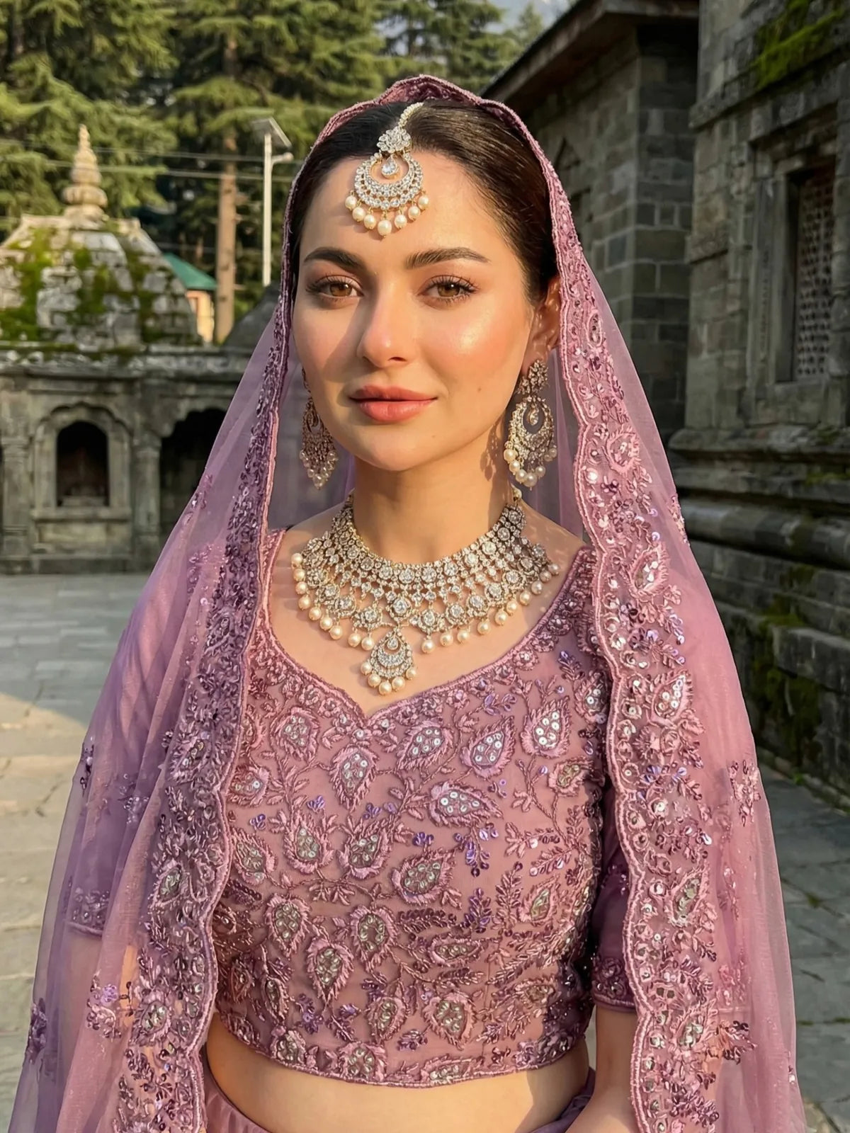 Tarani purple net lehenga close-up of blouse and dupatta embroidery with jarkan work
