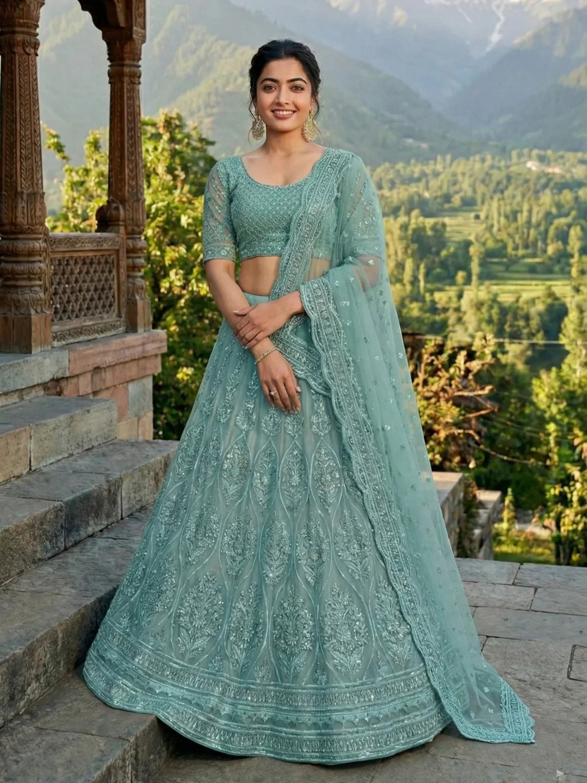 Tarani sea green net lehenga full view with intricate embroidery for wedding look
