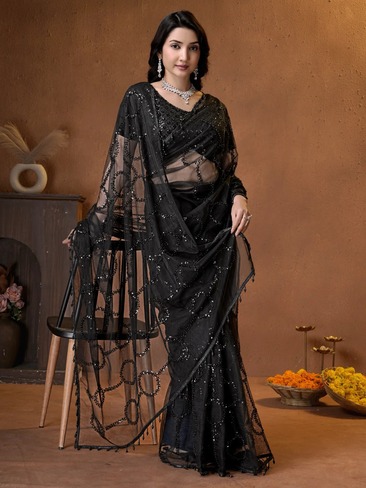 Tarani black embroidered net saree back view with designer blouse
