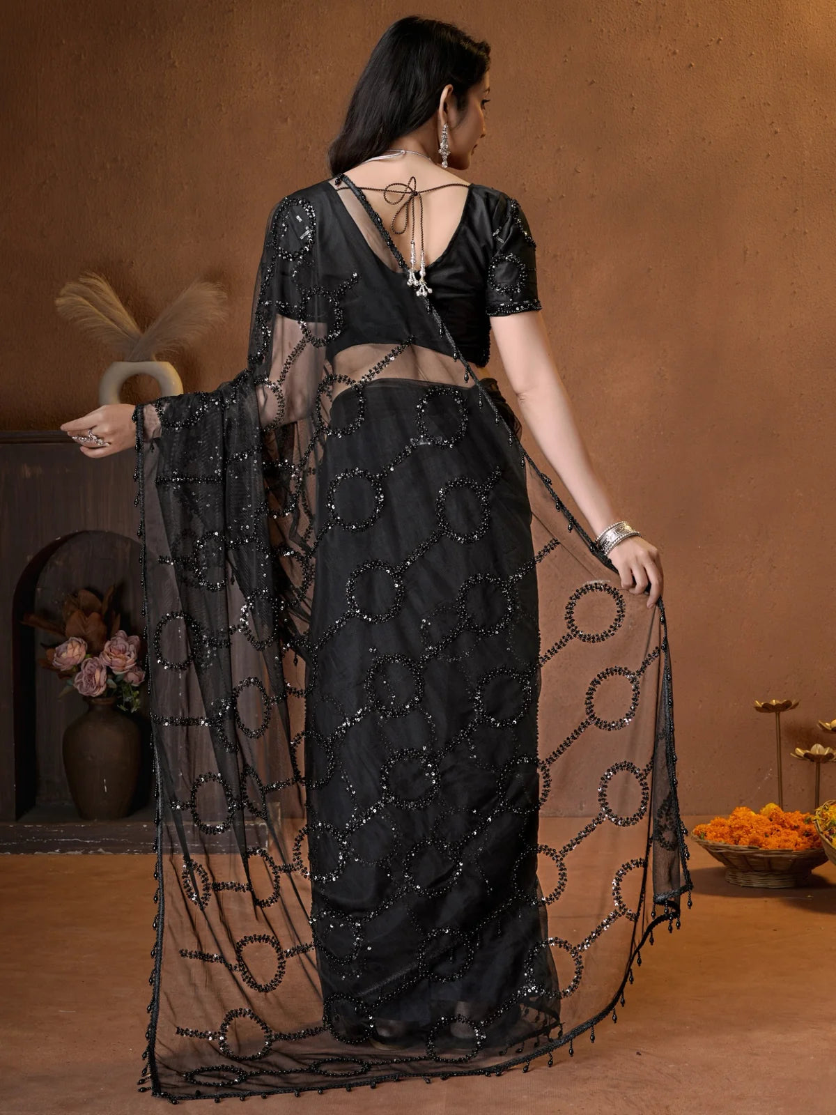 Tarani black net blouse back design and embroidery close view