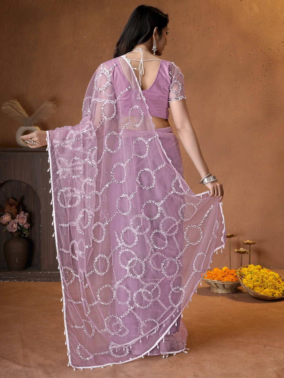 Tarani lavender net saree back view blouse and pallu design