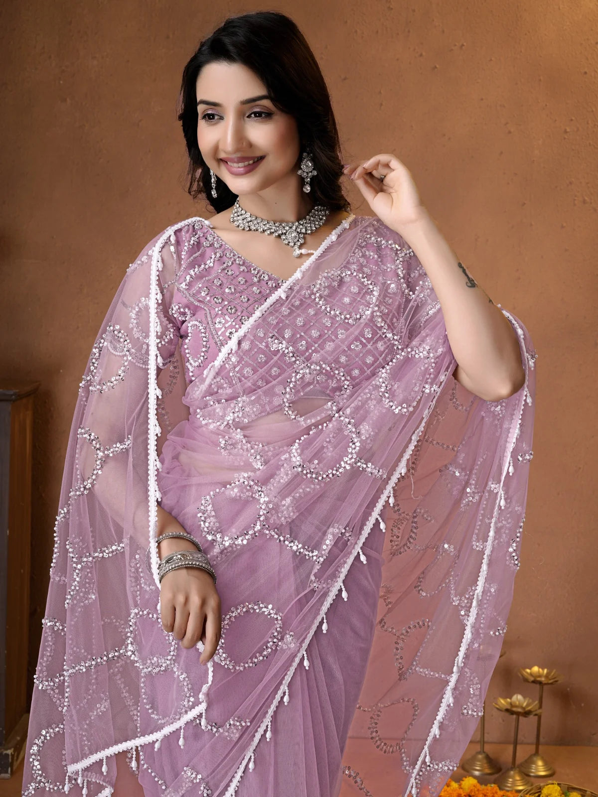 Tarani lavender net saree closeup showing embroidery detailing