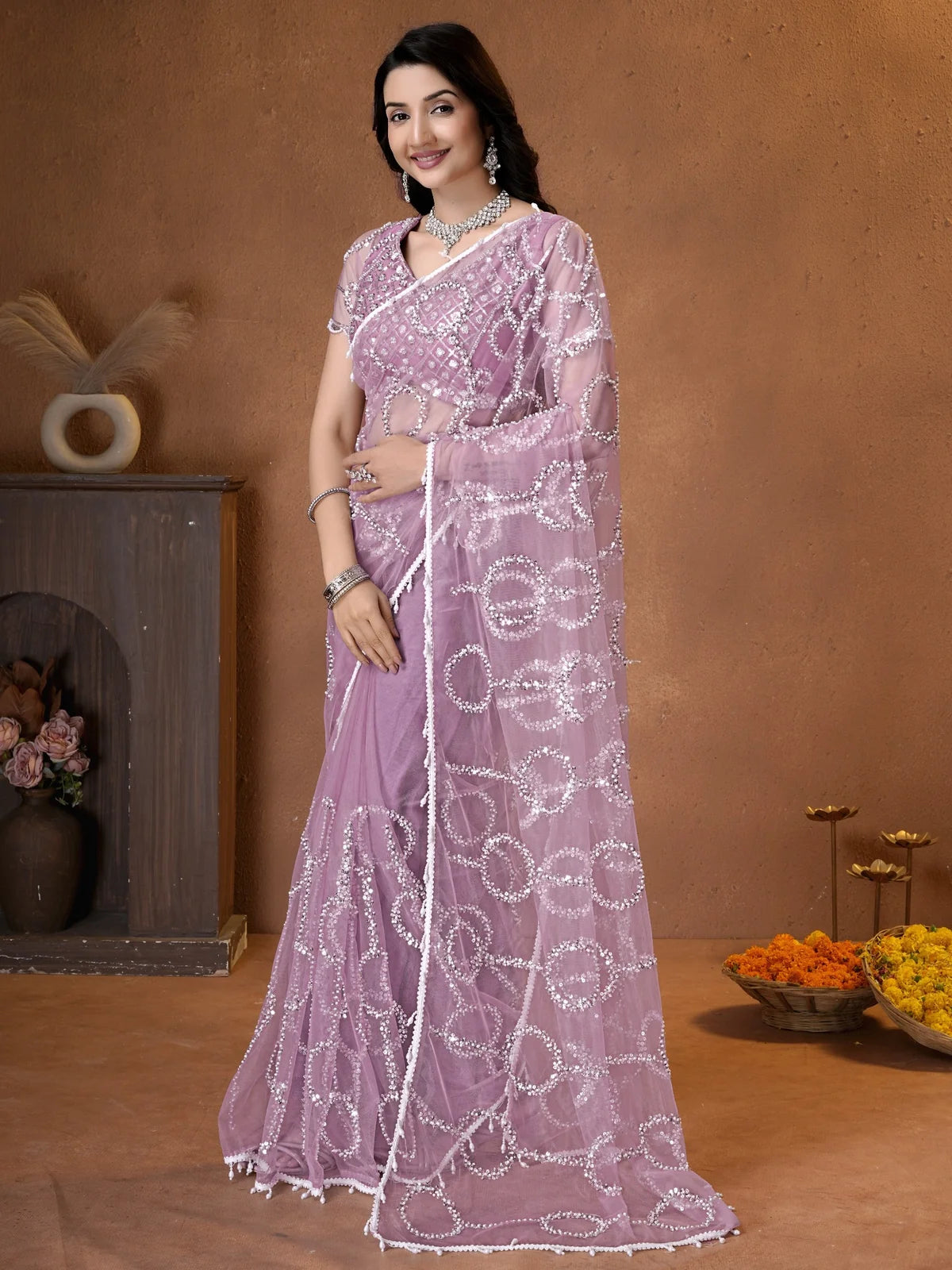 Tarani lavender net saree front view party wear designer saree