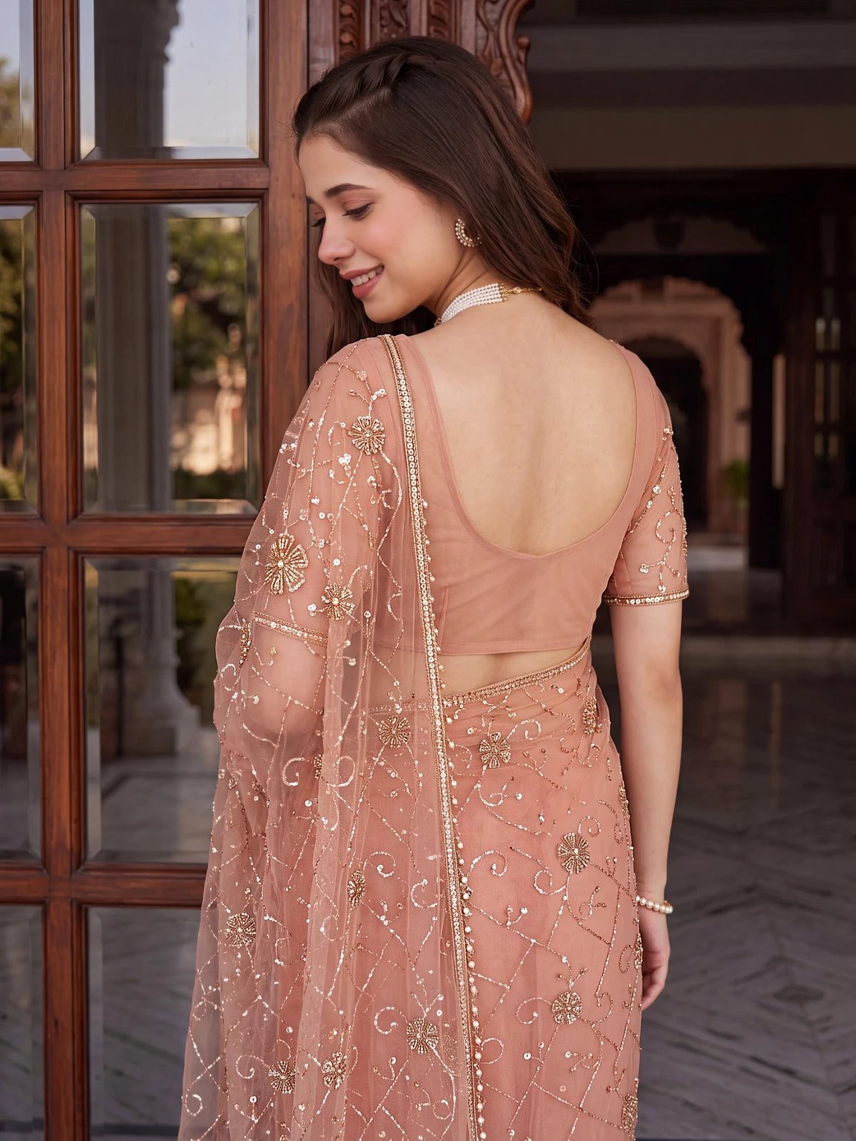 Tarani peach net embroidered saree with beads sequins pearls blouse view