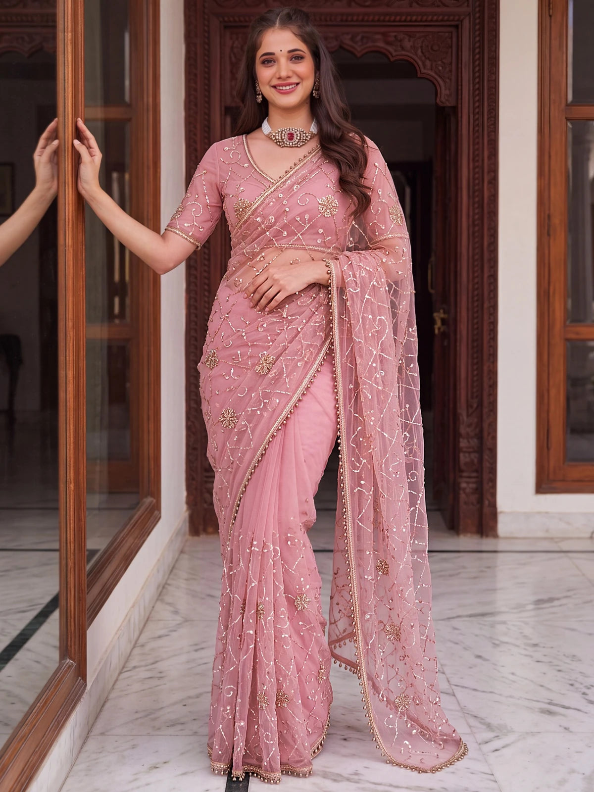 Tarani pink net saree with beads sequins and pearl embroidery side-view
