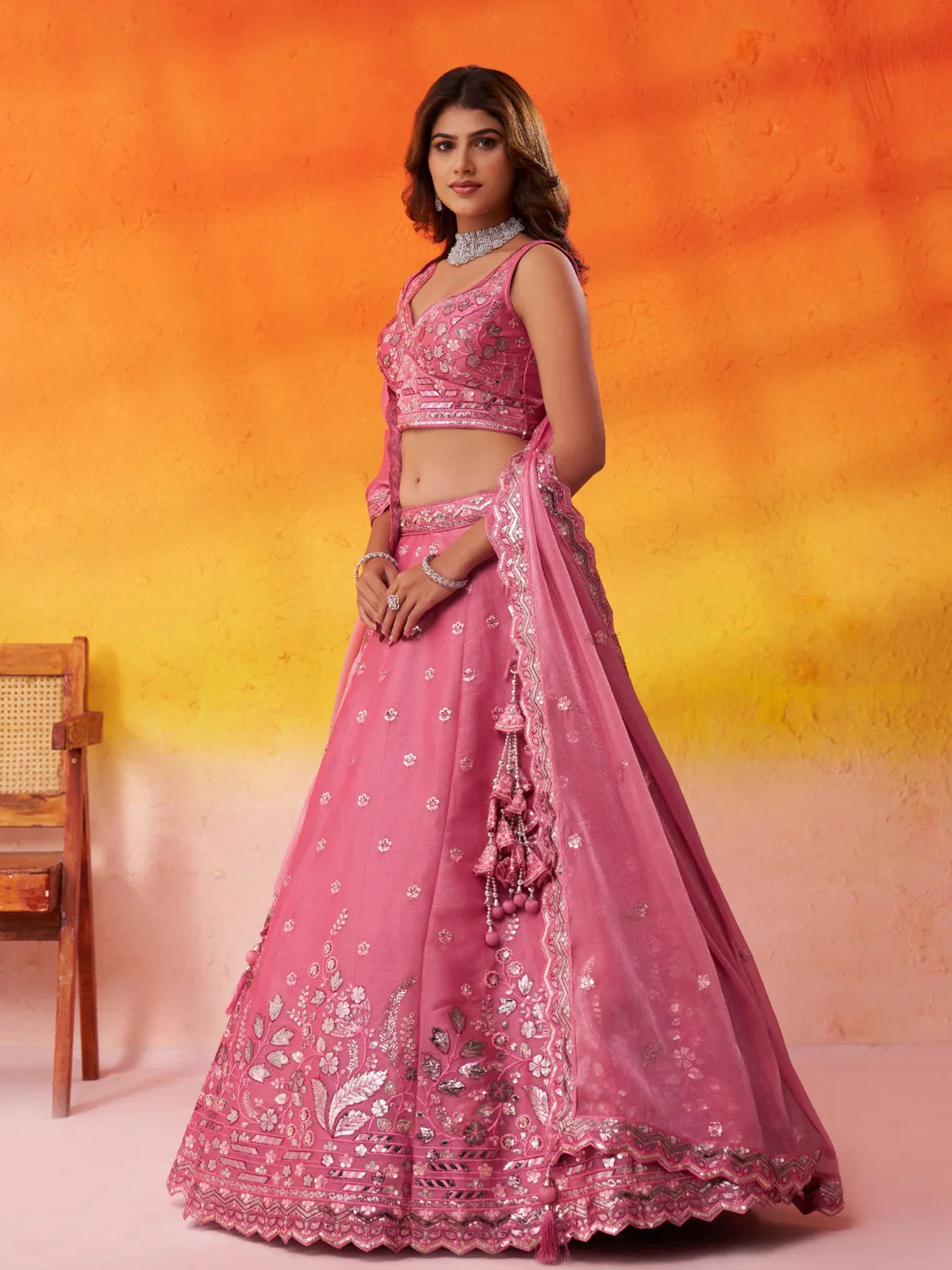 Tarani pink organza lehenga side profile showing full flair and dupatta fall