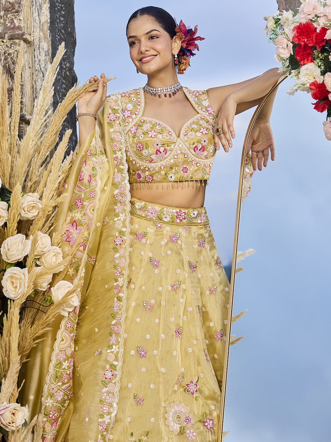 Tarani yellow organza lehenga with embroidered blouse upper body view