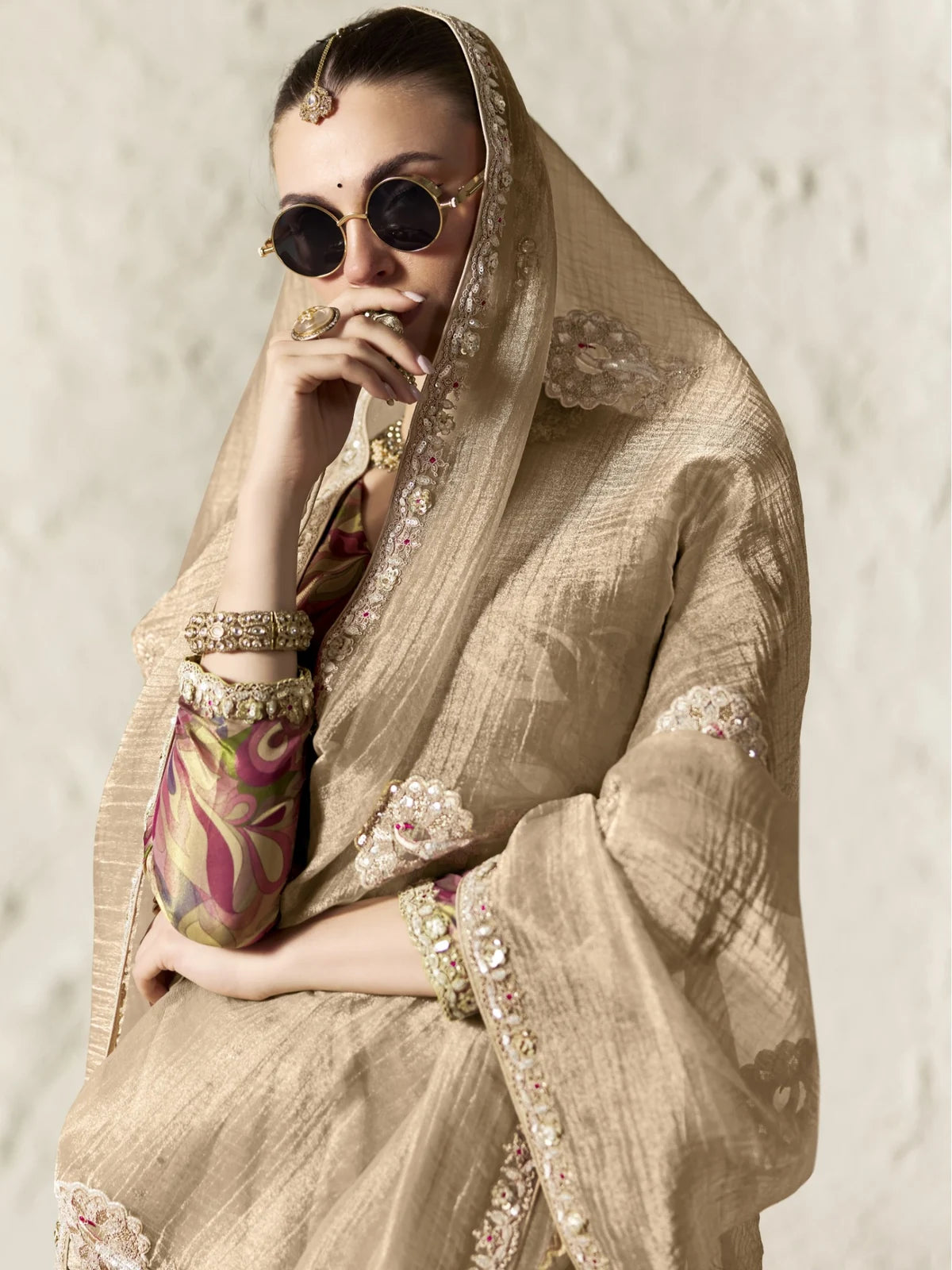 Tarani beige tissue organza saree upper body view with sequins embroidery and digital print blouse