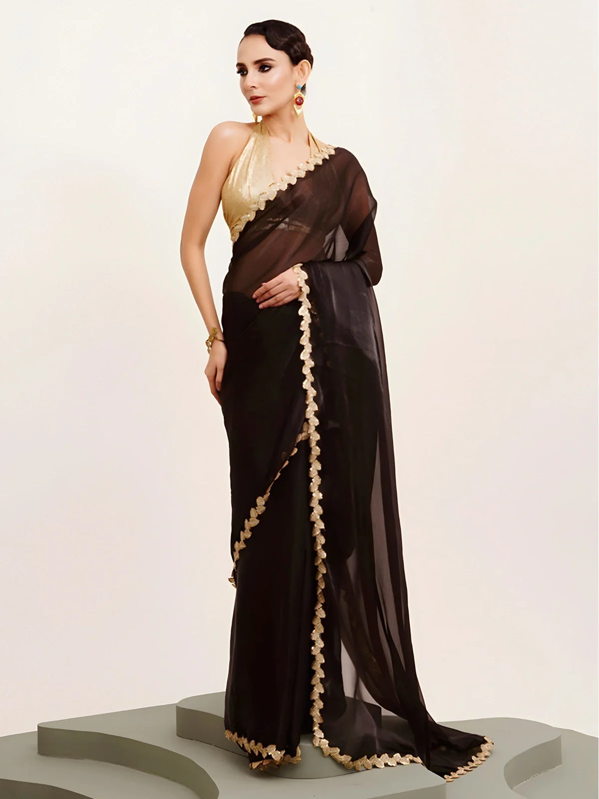 Tarani elegant black organza saree with gold blouse and sequin lace border for festive parties